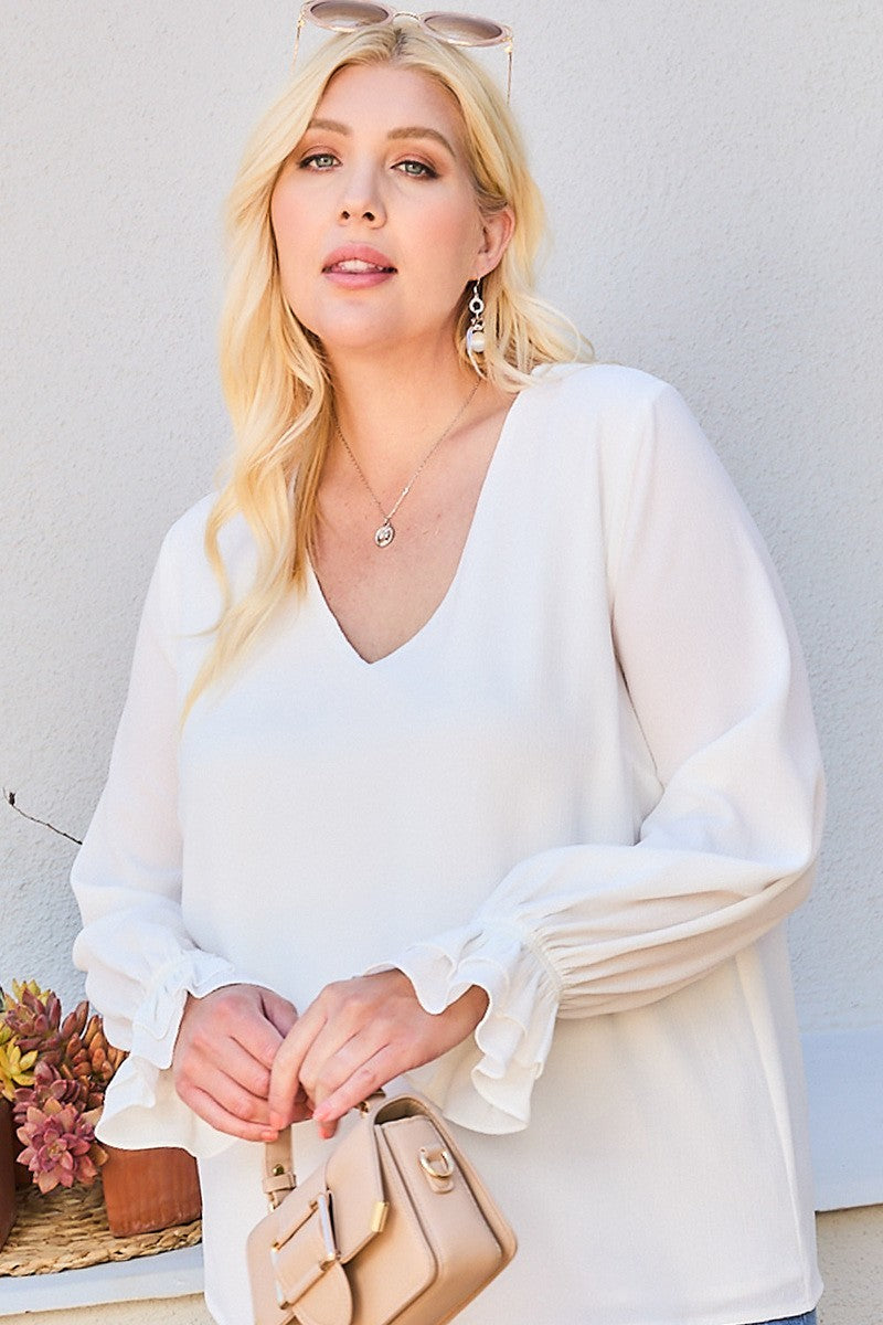 White V-neck tier ruffle sleeve top with gathered, flounced cuffs