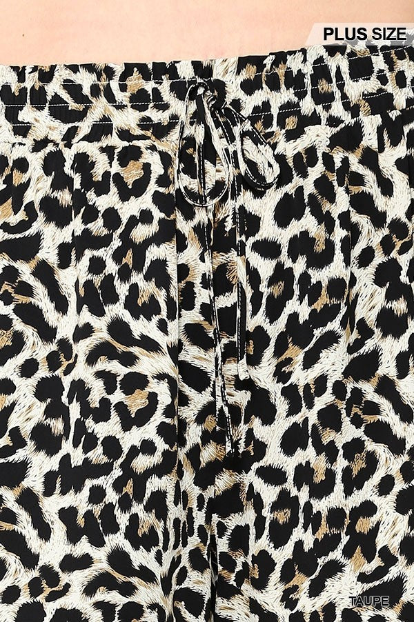 Taupe leopard print fabric close-up with waist tie detail for side-pocket shorts
