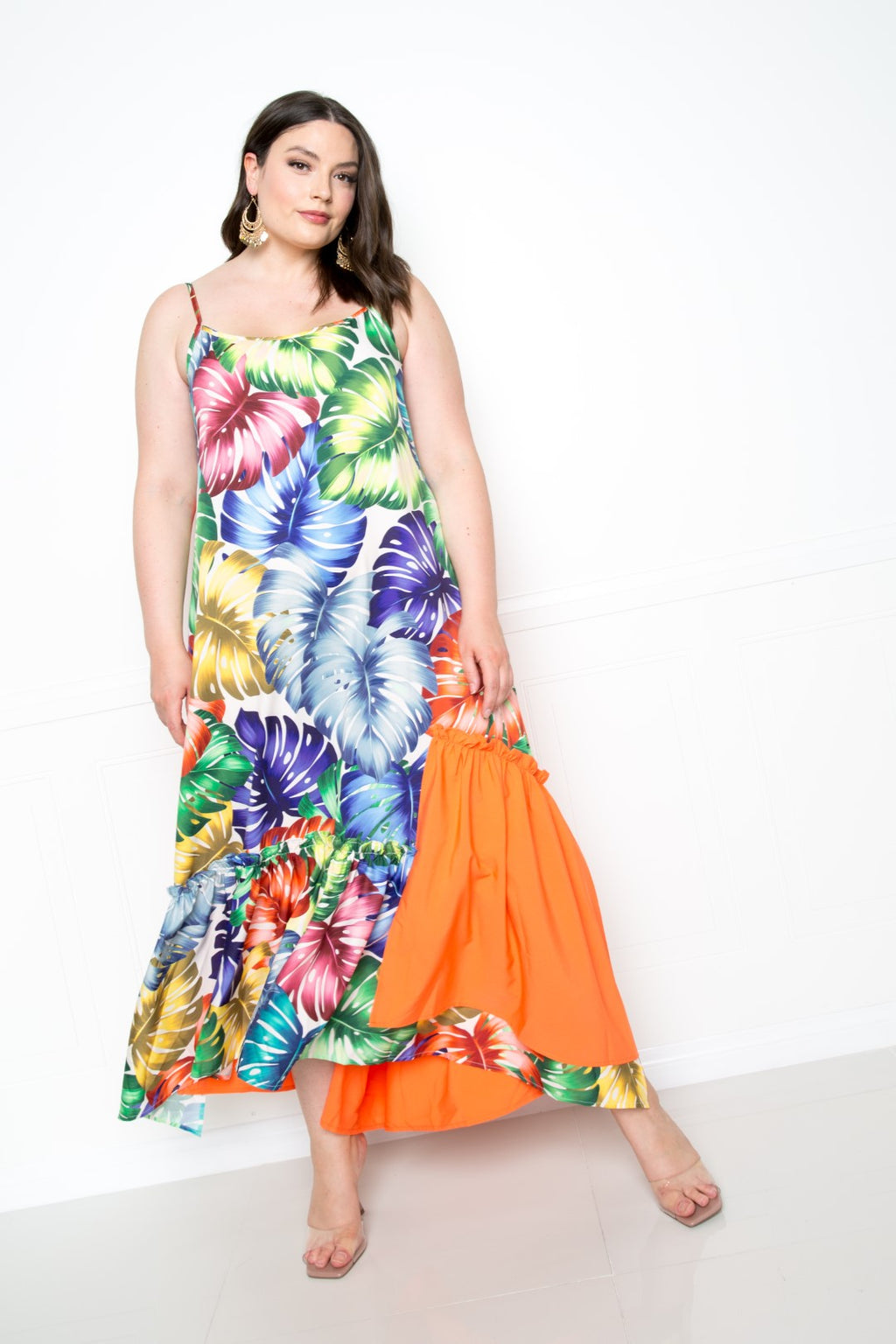 Splice tropical dress in multi floral print with orange solid ruffle panels, midi length