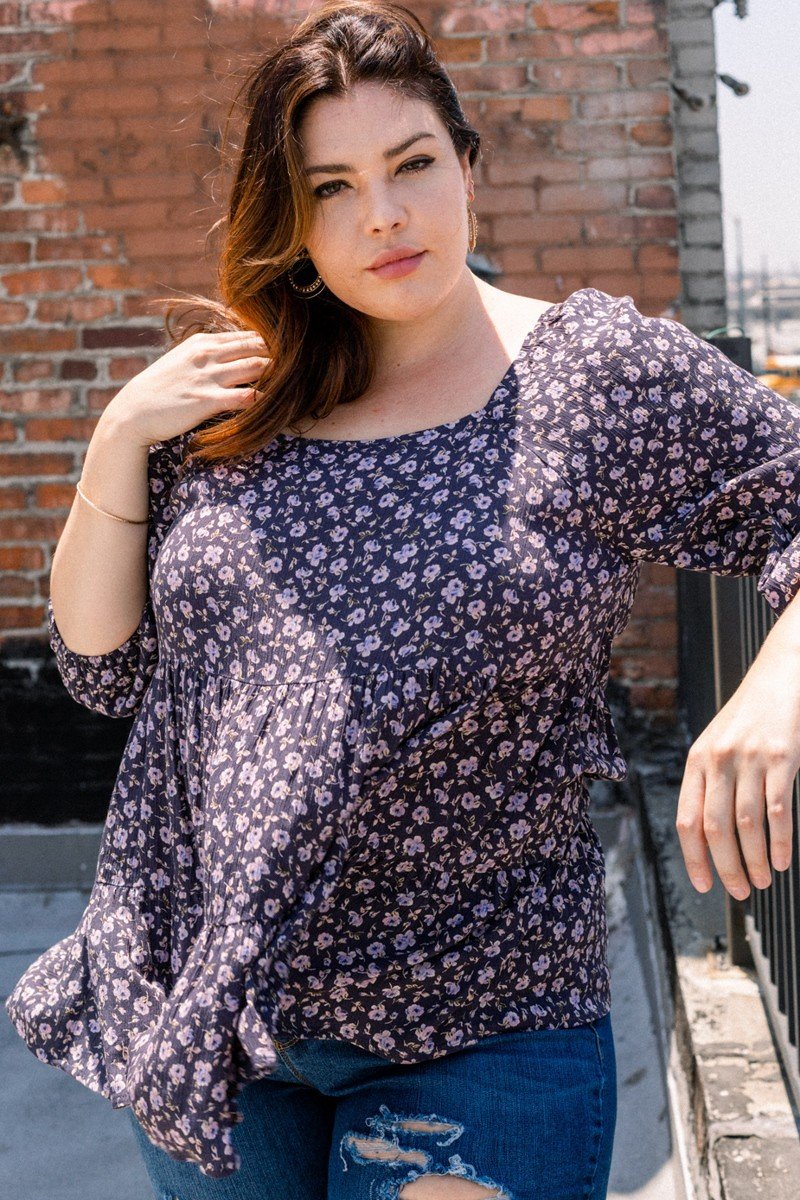 Navy floral square-neck top with gathered waist and puffed sleeves