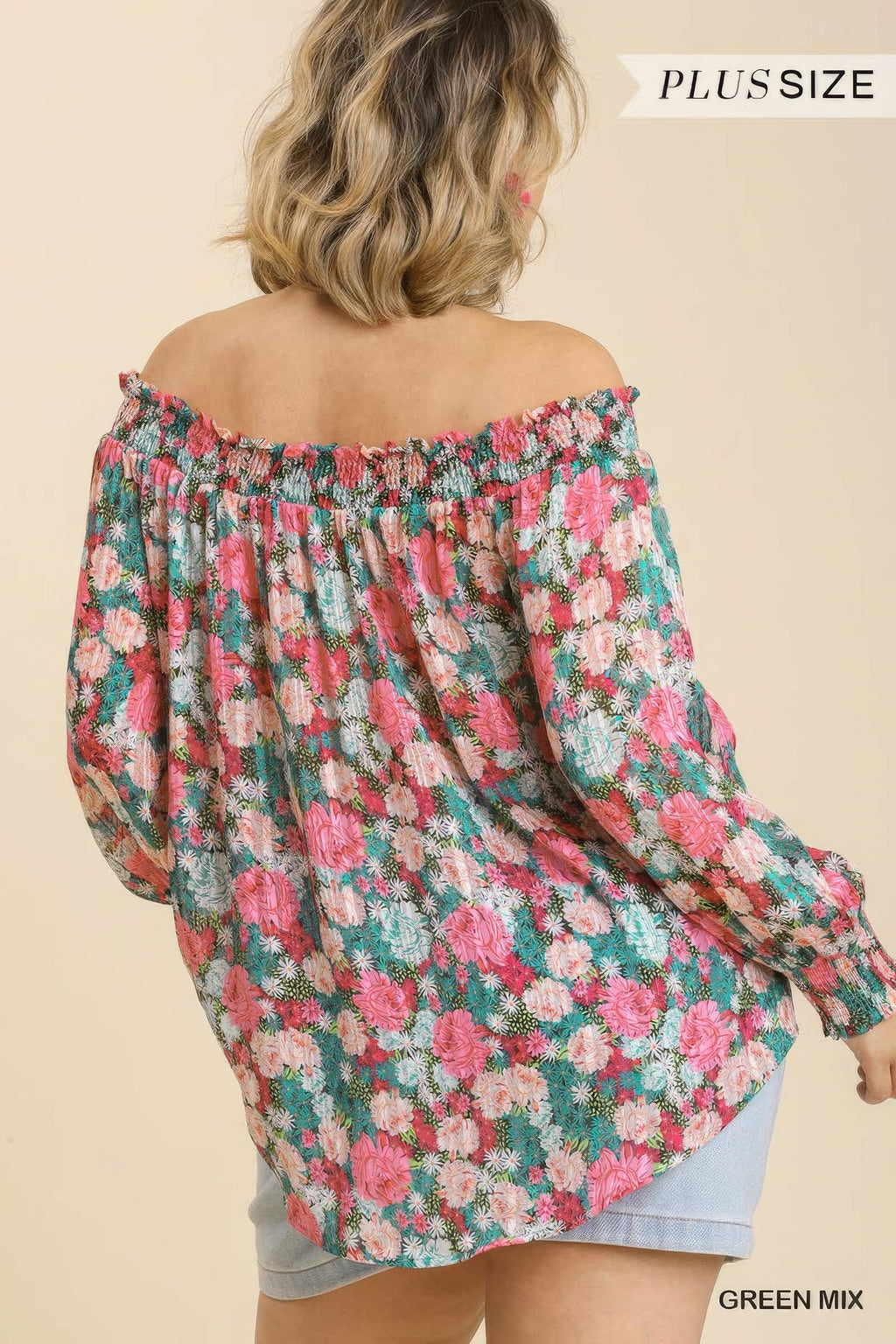 Back view: off-shoulder floral top with long puff sleeves, green-mix print