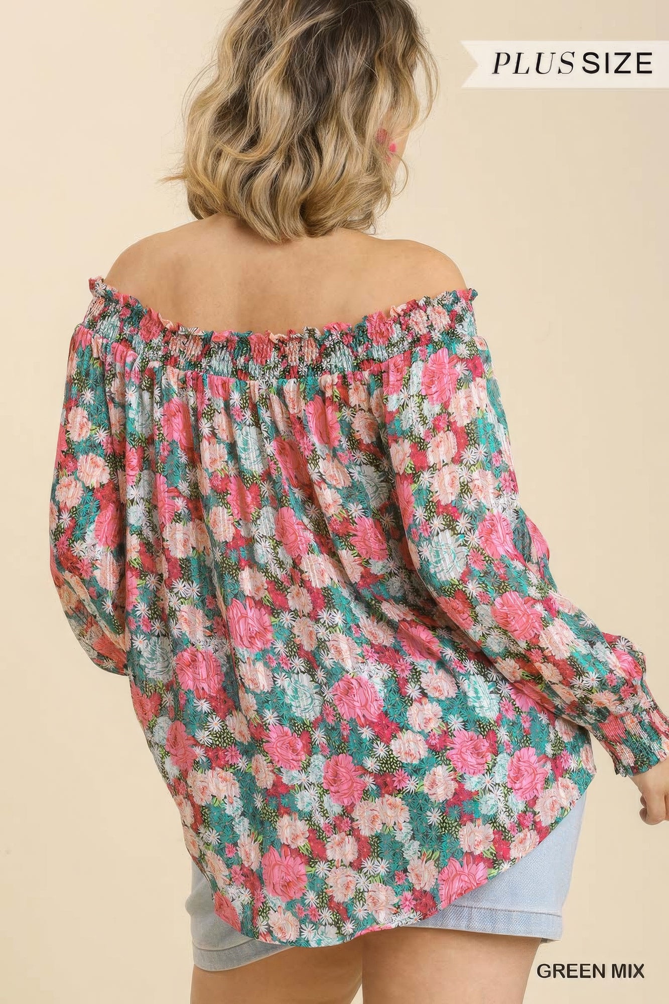 Back view: off-shoulder floral top with long puff sleeves, green-mix print