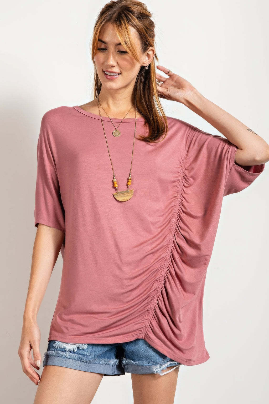 Mauve loose-fit top with side ruched gathers and draped short sleeves