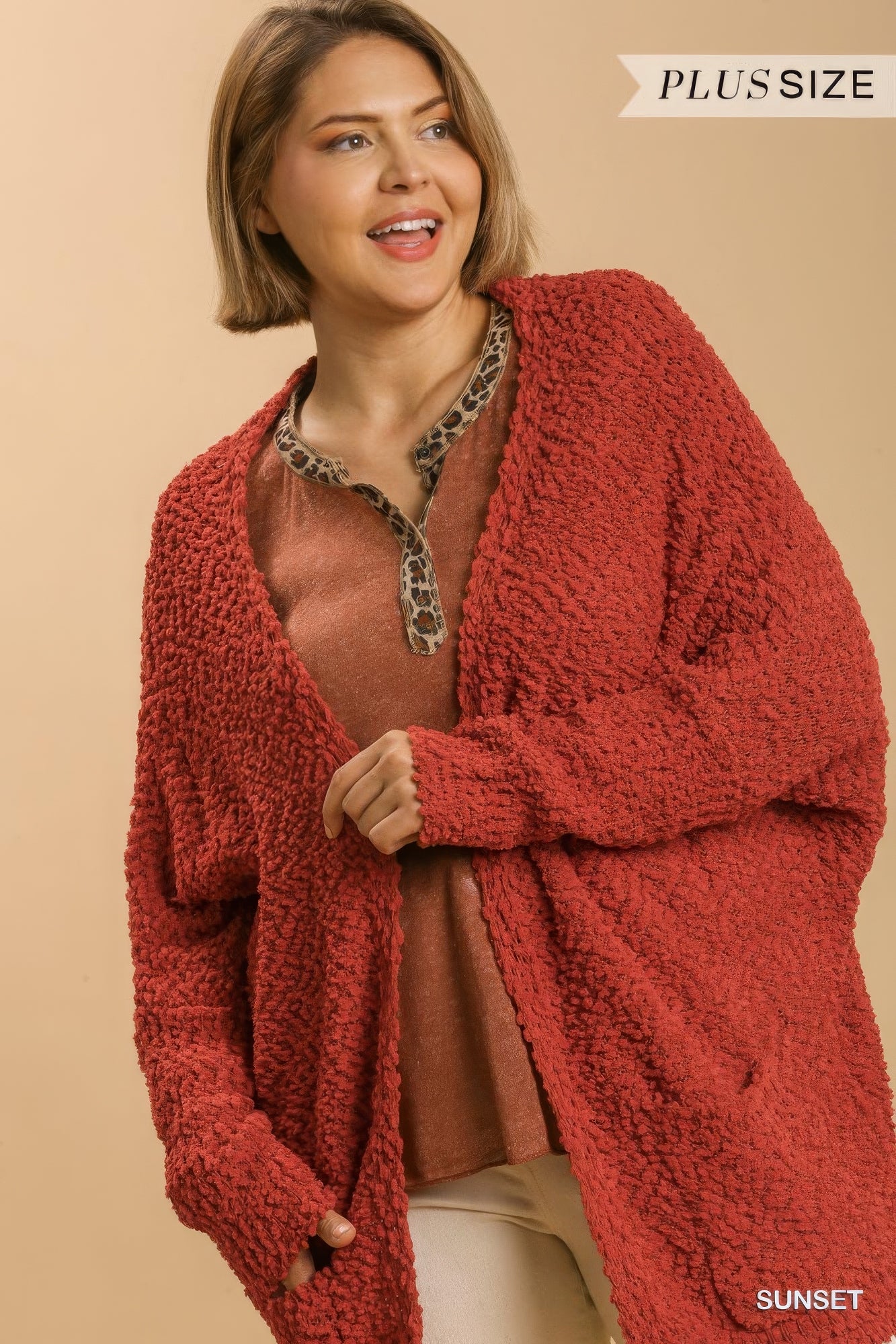 Open-front oversized cardigan sweater with pockets, sunset red textured knit