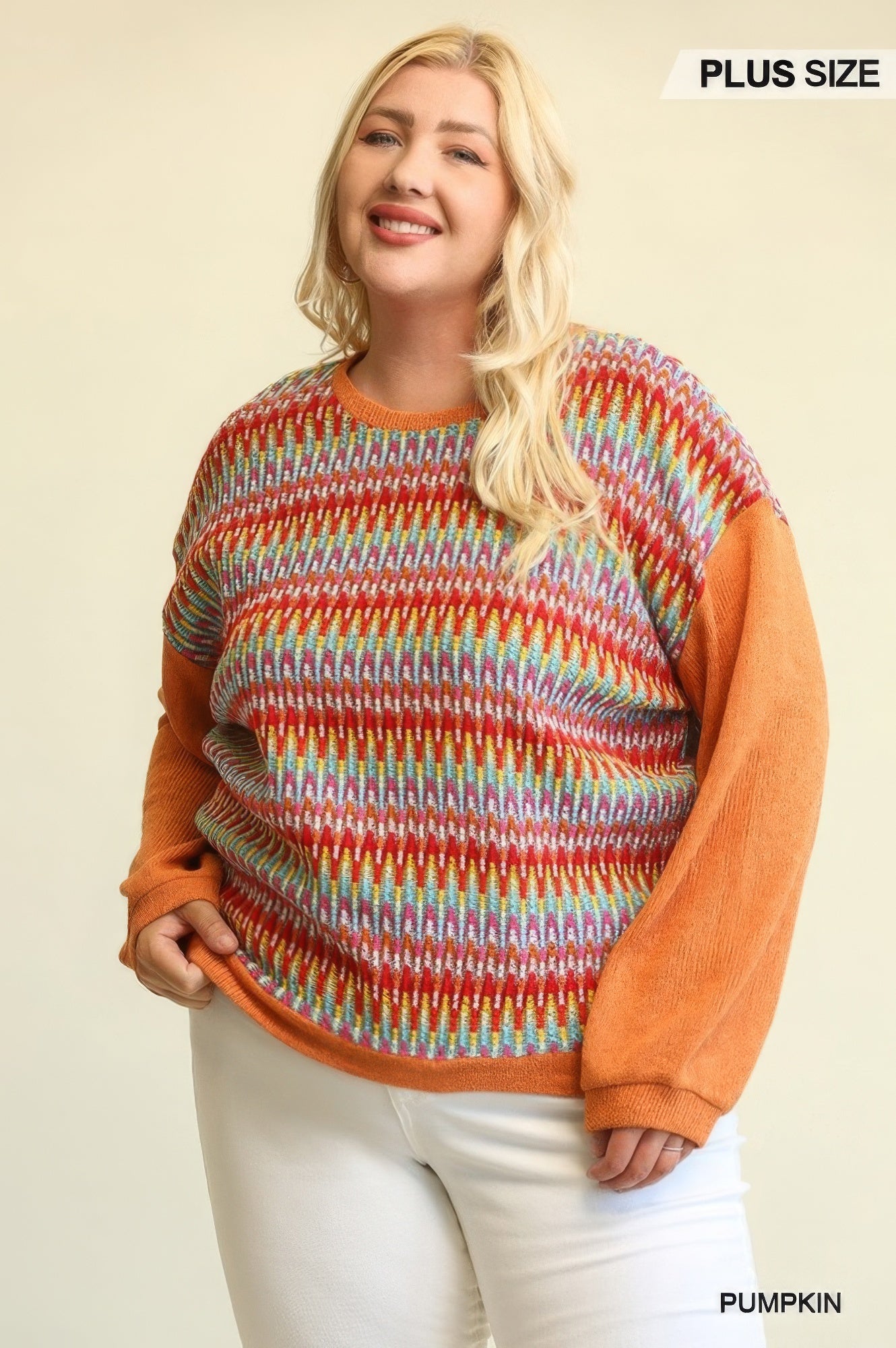 Pumpkin mixed knit loose top with multicolor striped yoke and solid orange sleeves