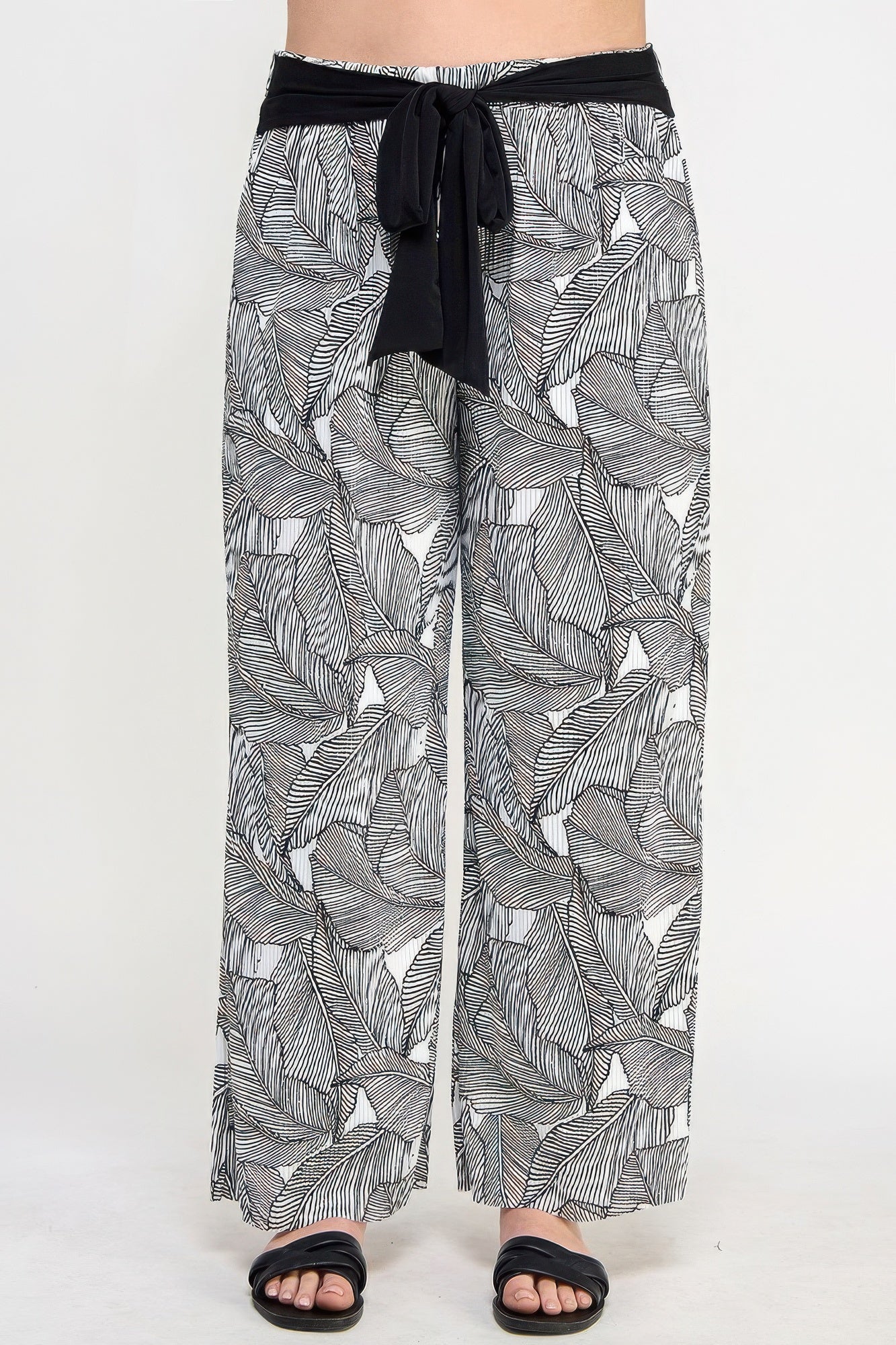 Plisse palm print pants, black elastic waistband with tie, wide-leg striped leaf pattern