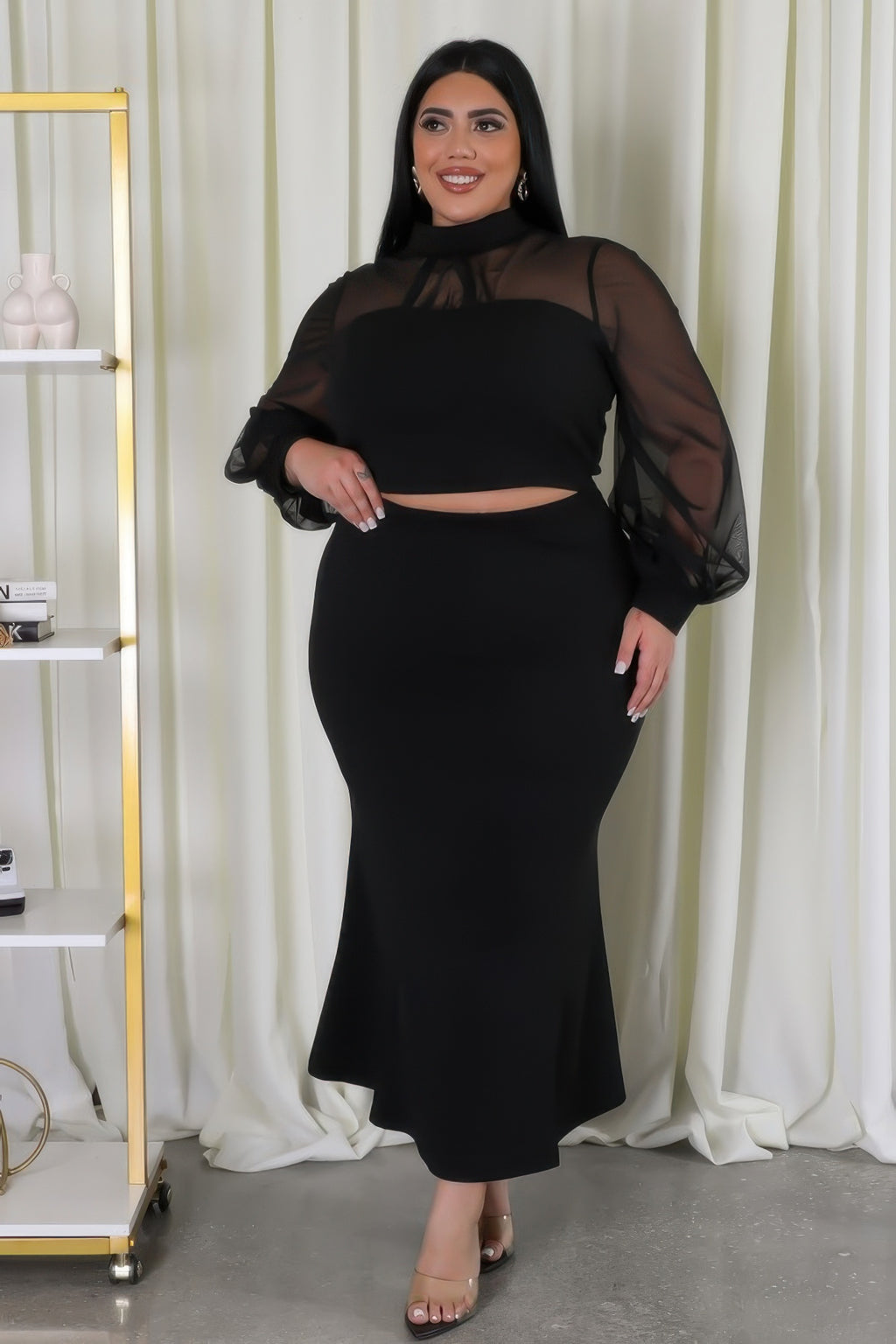 Stretch skirt set in black: long pencil skirt with mesh puff sleeves and high neckline top