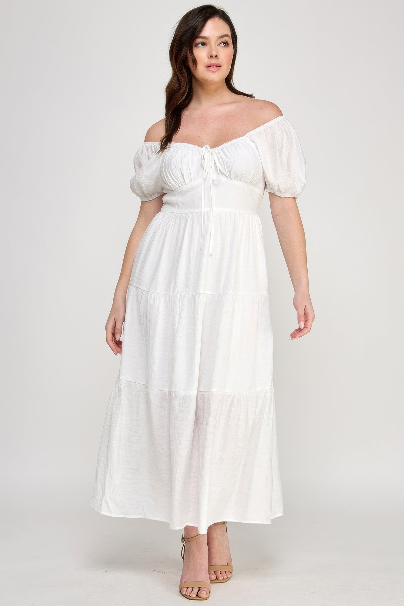 White off-shoulder tiered maxi dress with front tie at bust and puff sleeves