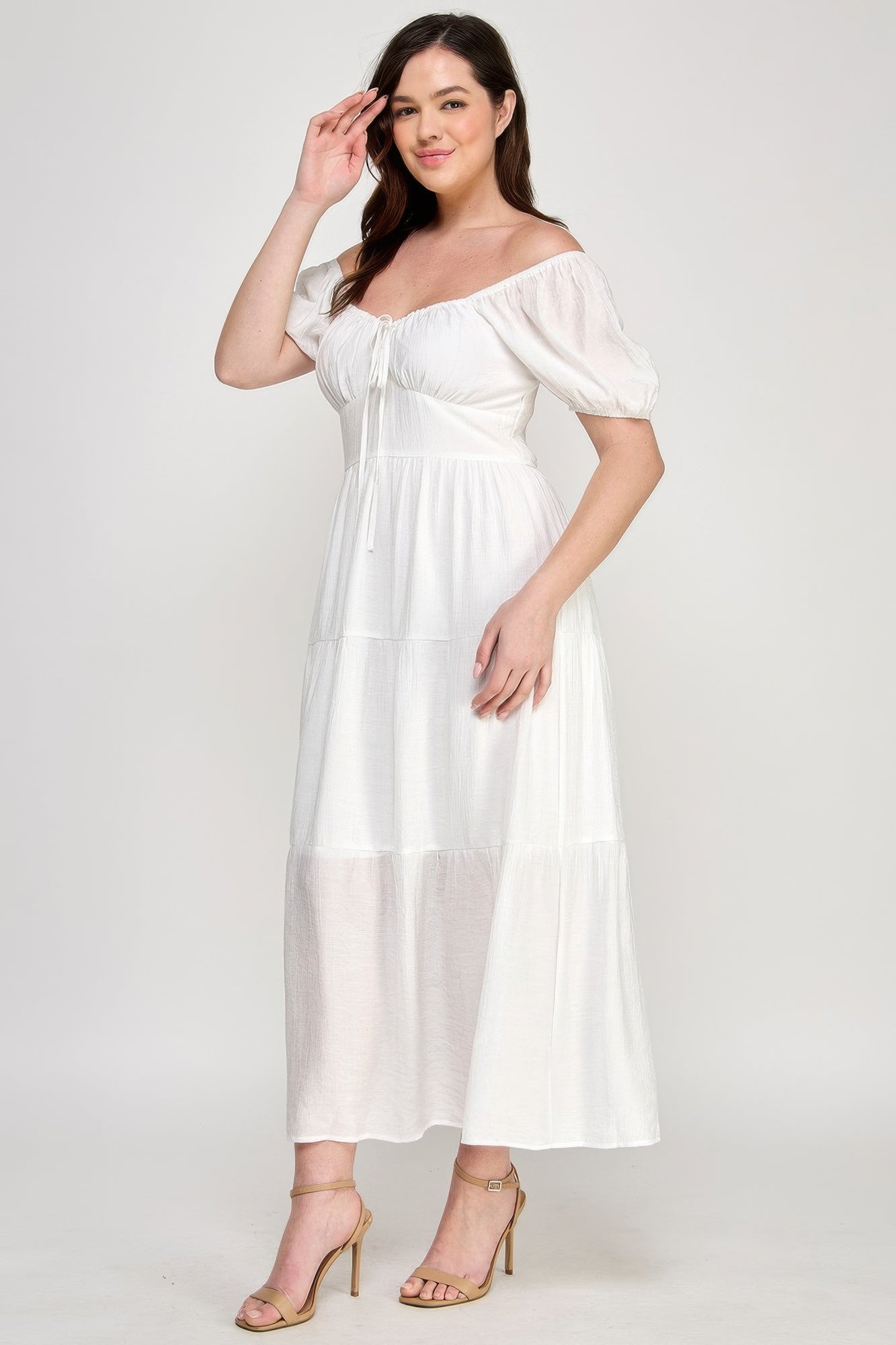 White maxi dress with front tie, puff sleeves, square neckline, tiered skirt