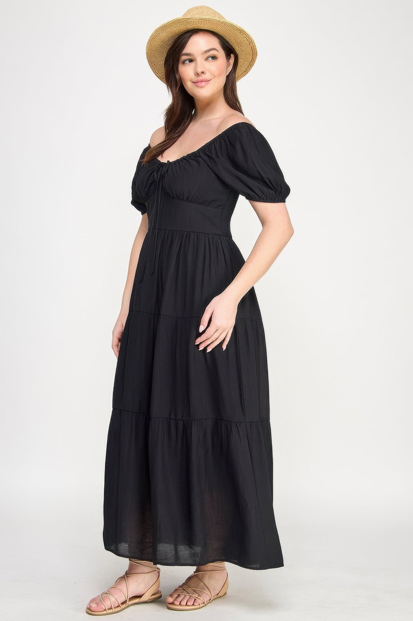 Three-quarter view tiered maxi dress with front tie detail, black