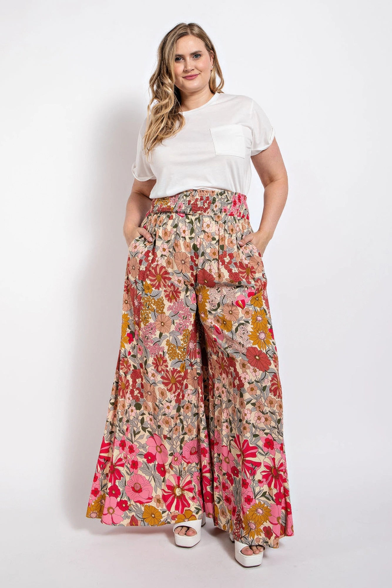 Multicolor floral wide-leg pants with smocked waist and side pockets, full length