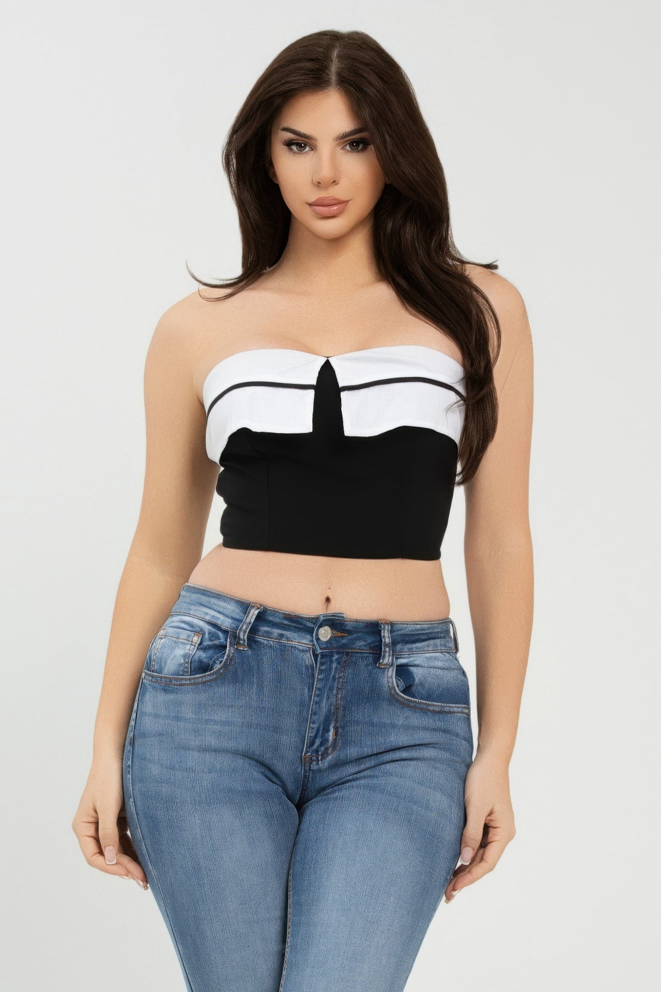 Black and white fold-over strapless tube top with central notch detail