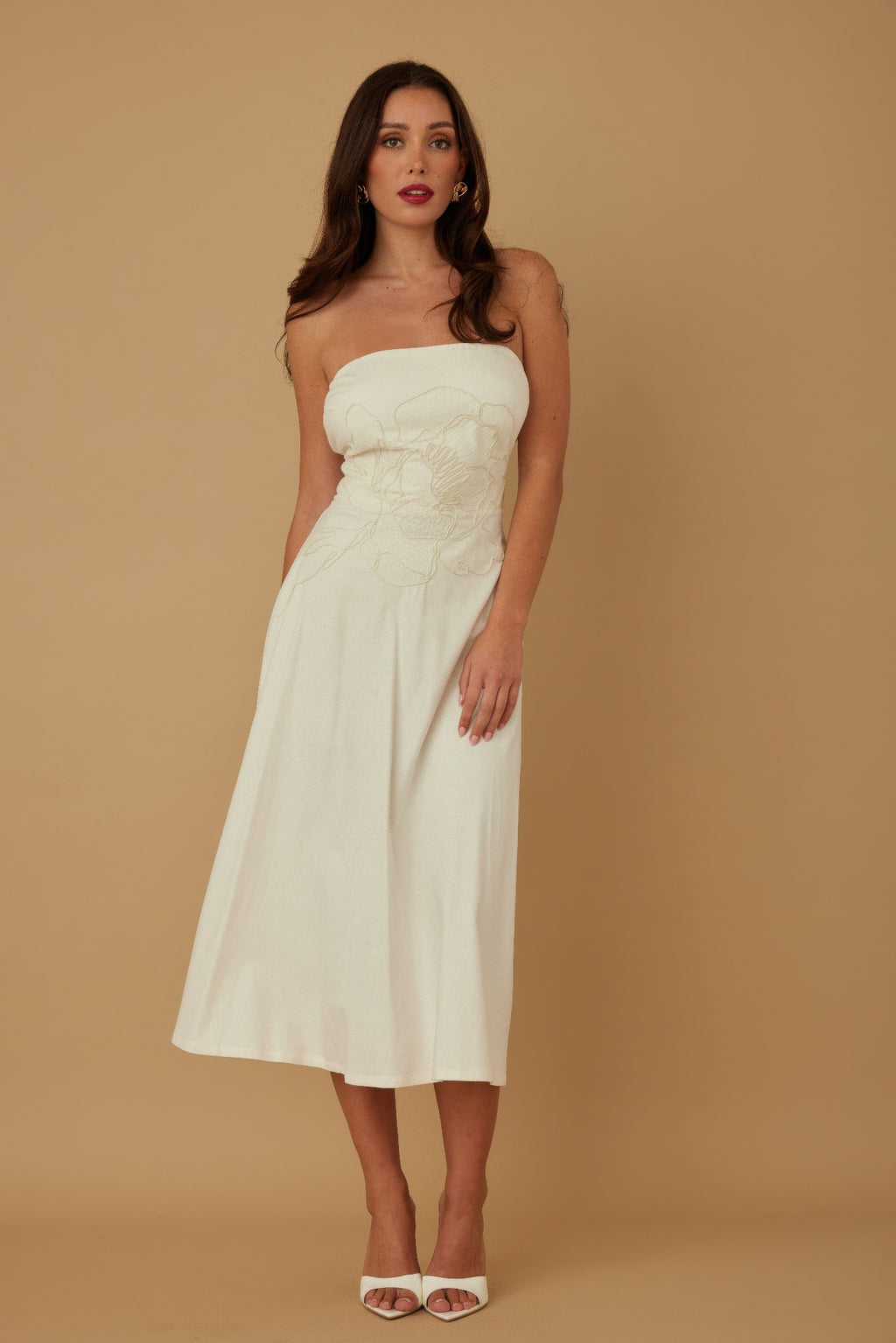 Ivory linen strapless midi dress featuring floral embroidery and ruched bodice