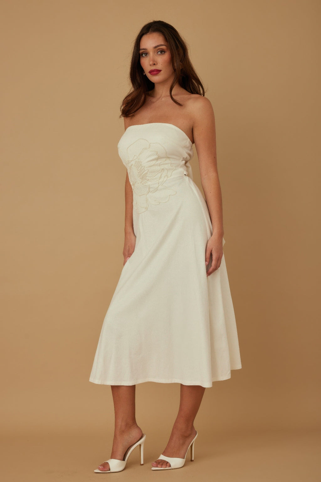 Ivory strapless linen midi dress with floral motif, fitted top and flared skirt