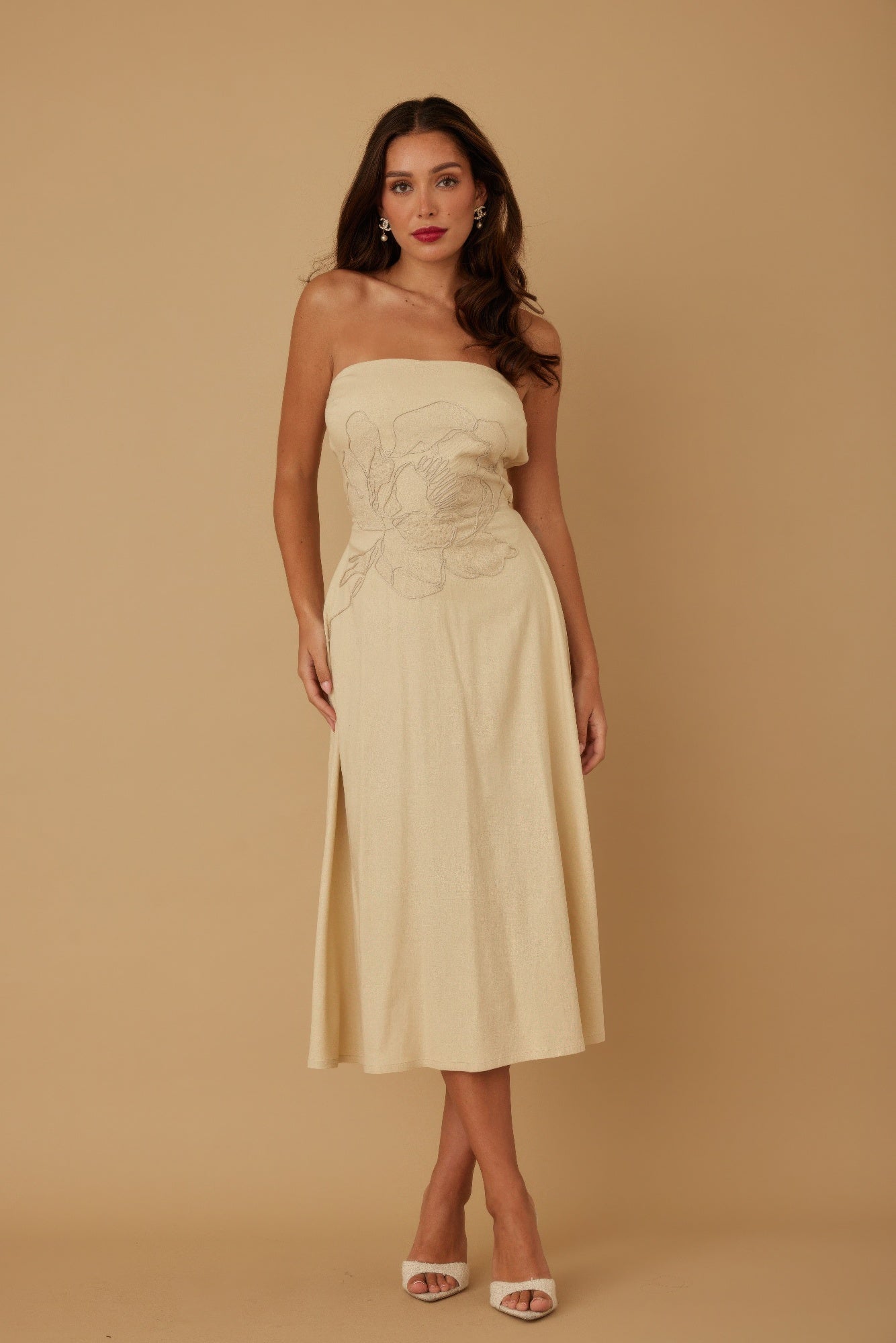 Ivory strapless linen midi dress with large floral applique and fitted silhouette