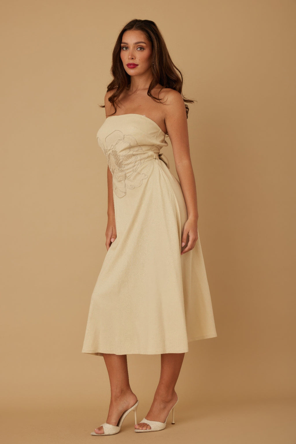 Ivory strapless linen dress with floral pattern, cinched waist, pleated skirt