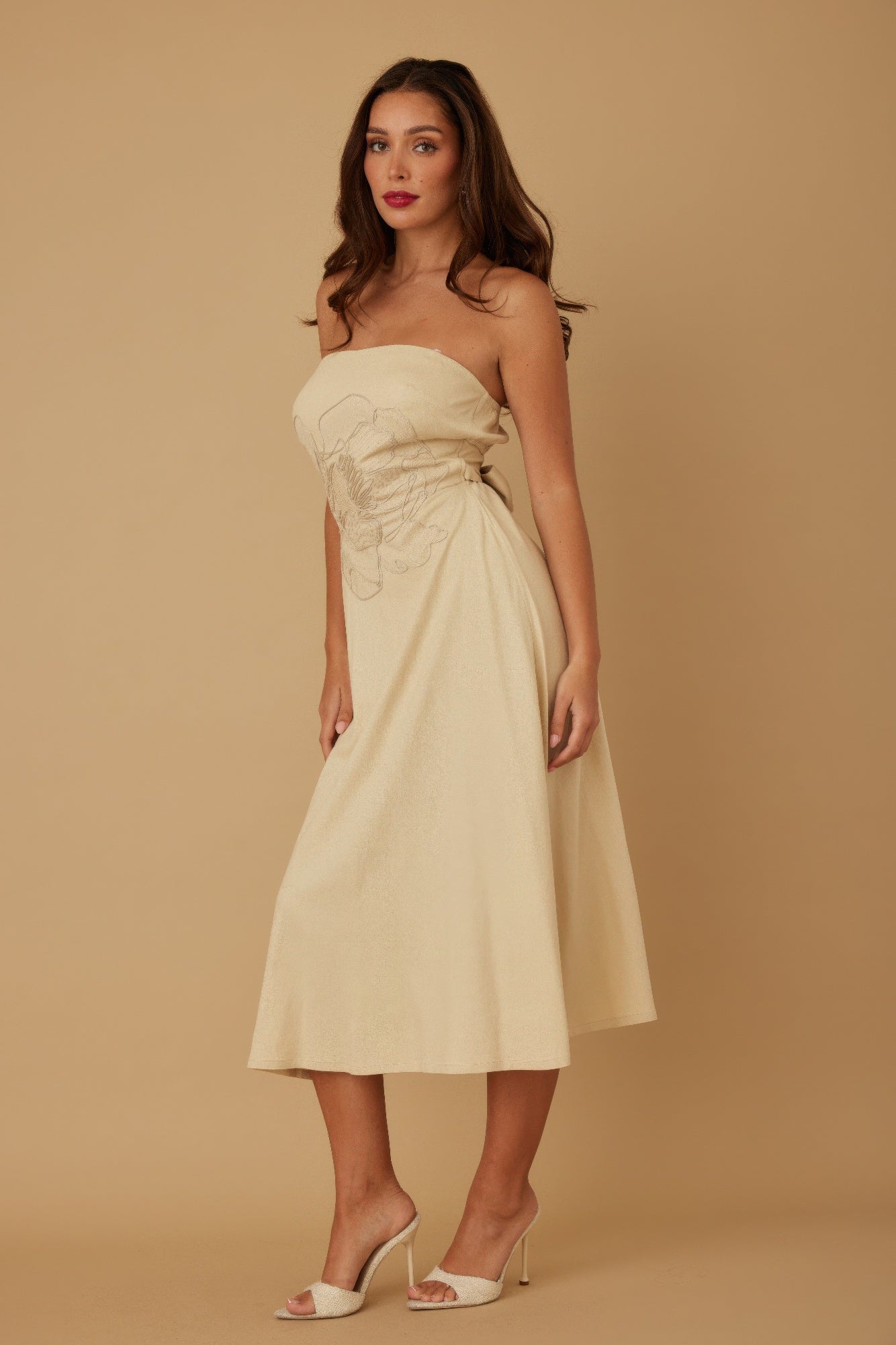 Ivory strapless linen dress with floral pattern, cinched waist, pleated skirt