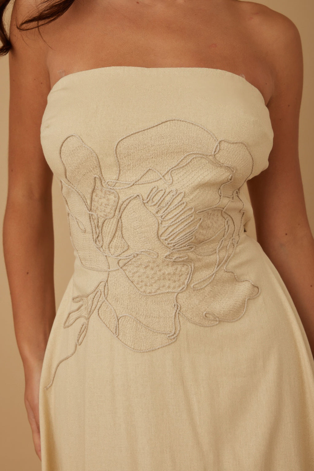 Ivory strapless linen dress with floral embroidery panel on fitted bodice