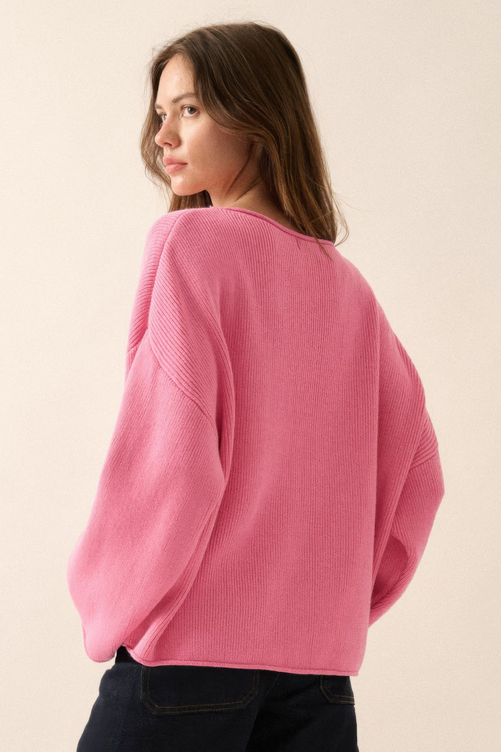 Pink oversized boatneck sweater with ribbed knit back and wide sleeves
