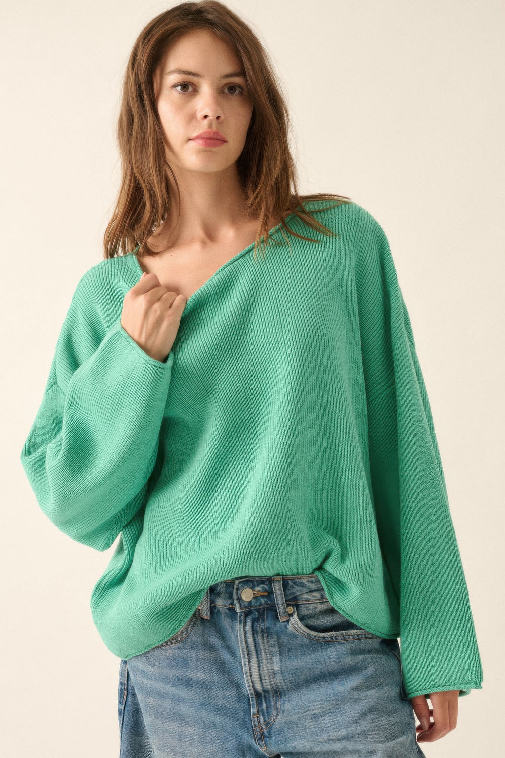 Pine green boatneck rib-knit sweater, loose fit, folded neckline detail visible