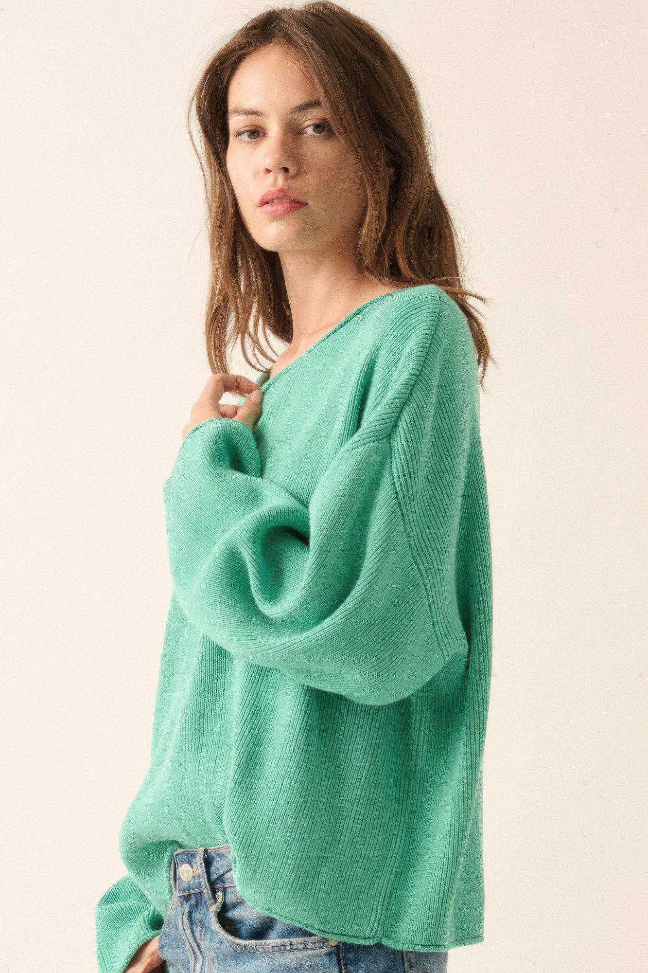Pine green oversized rib-knit boatneck sweater with wide collar and slouchy sleeves