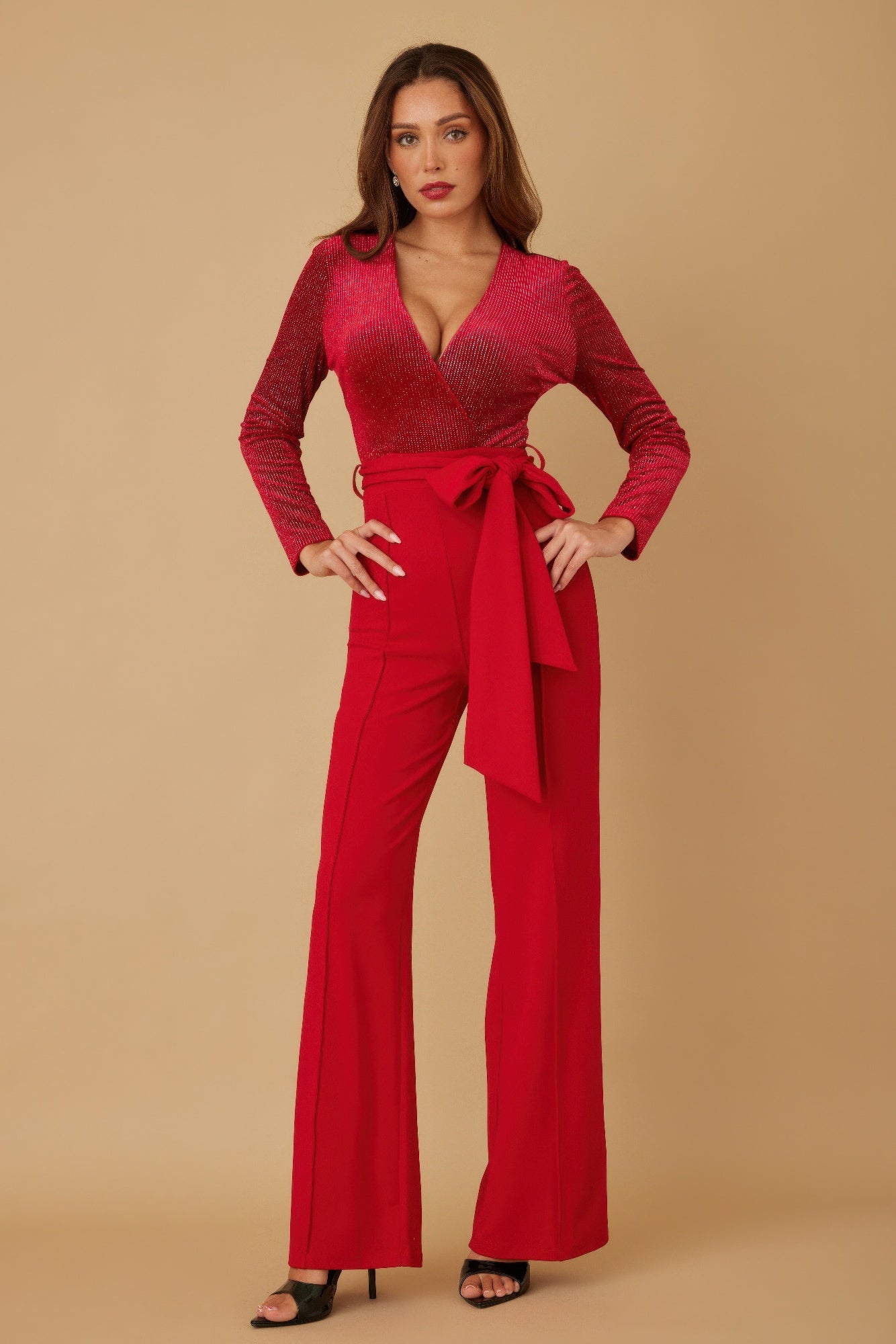 Red velvet top fashion jumpsuit with wrap-style V neckline and front waist bow