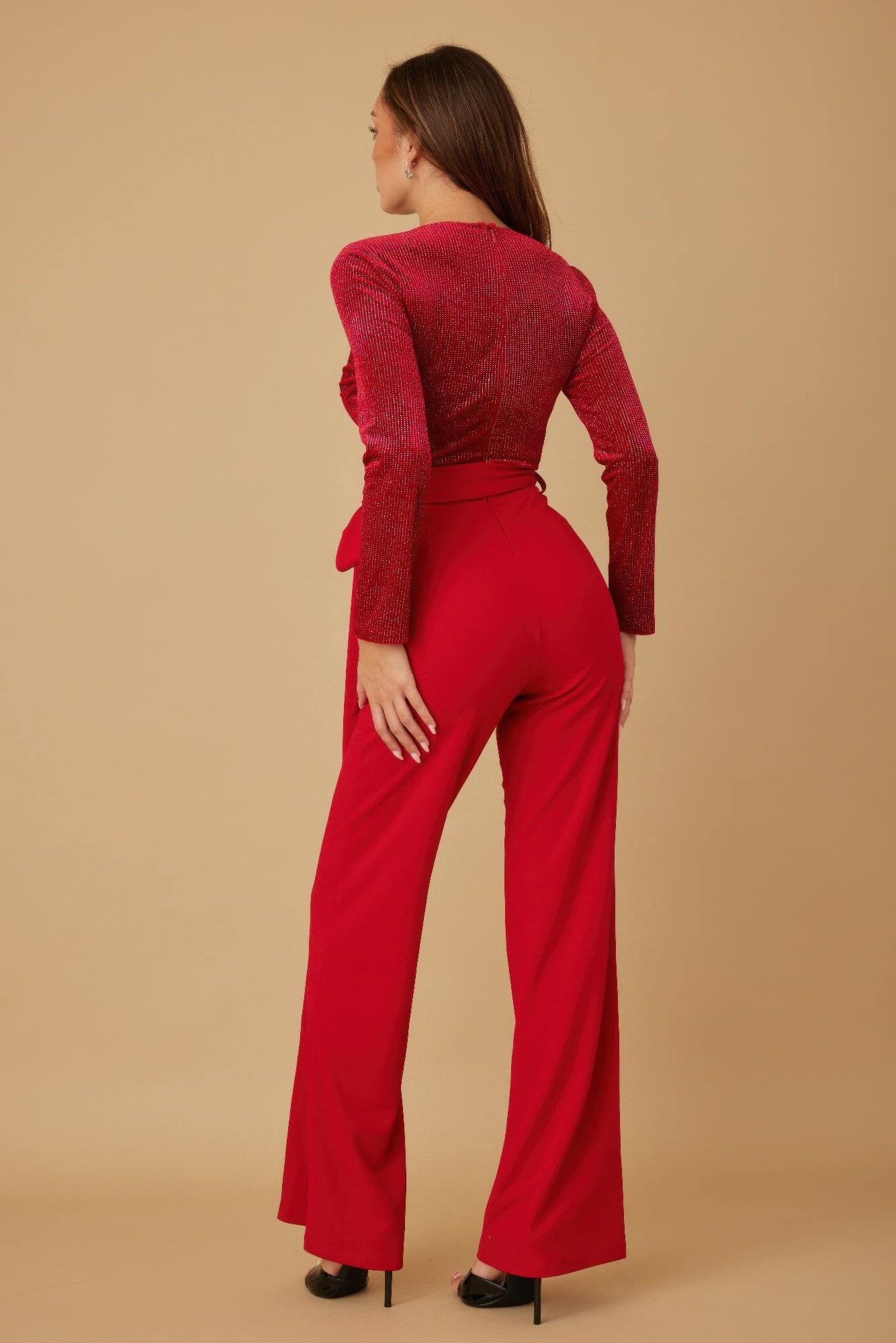 Red velvet top jumpsuit, back view with fitted waist and wide-leg pants