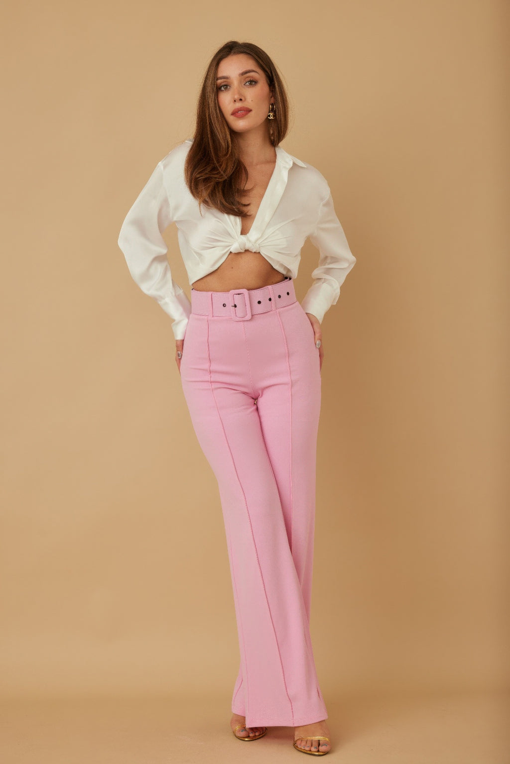 High-waist pants with buckle belt, light pink wide-leg trousers