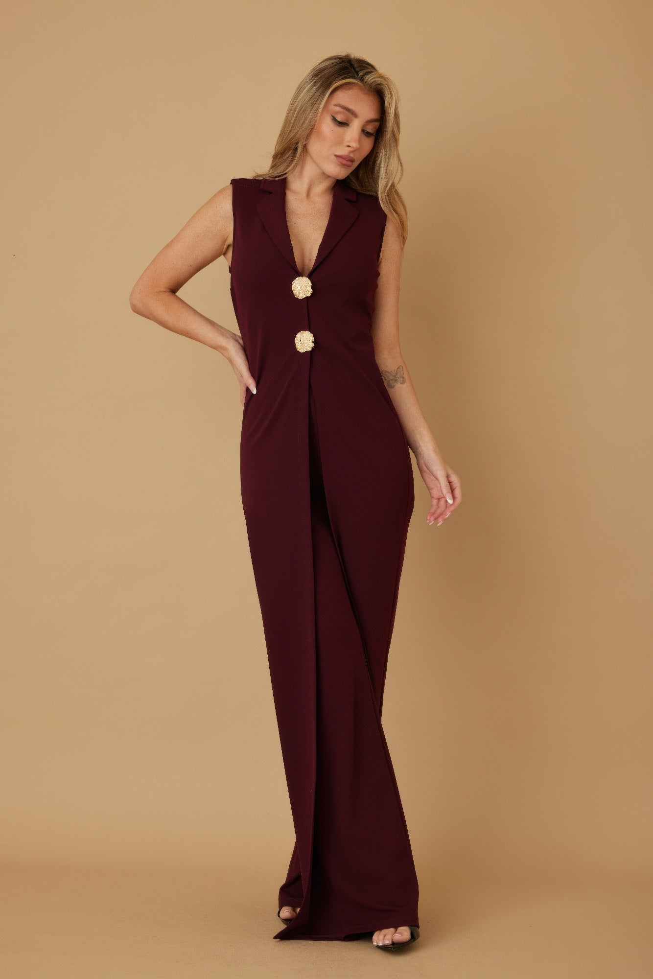 Wine open-front jumpsuit with V-neckline and two gold-toned metal shank buttons
