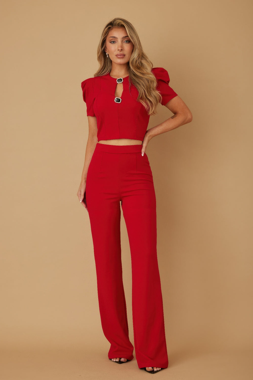 Red two-piece outfit with puff cap sleeves, jewel keyhole crop top & flared pants