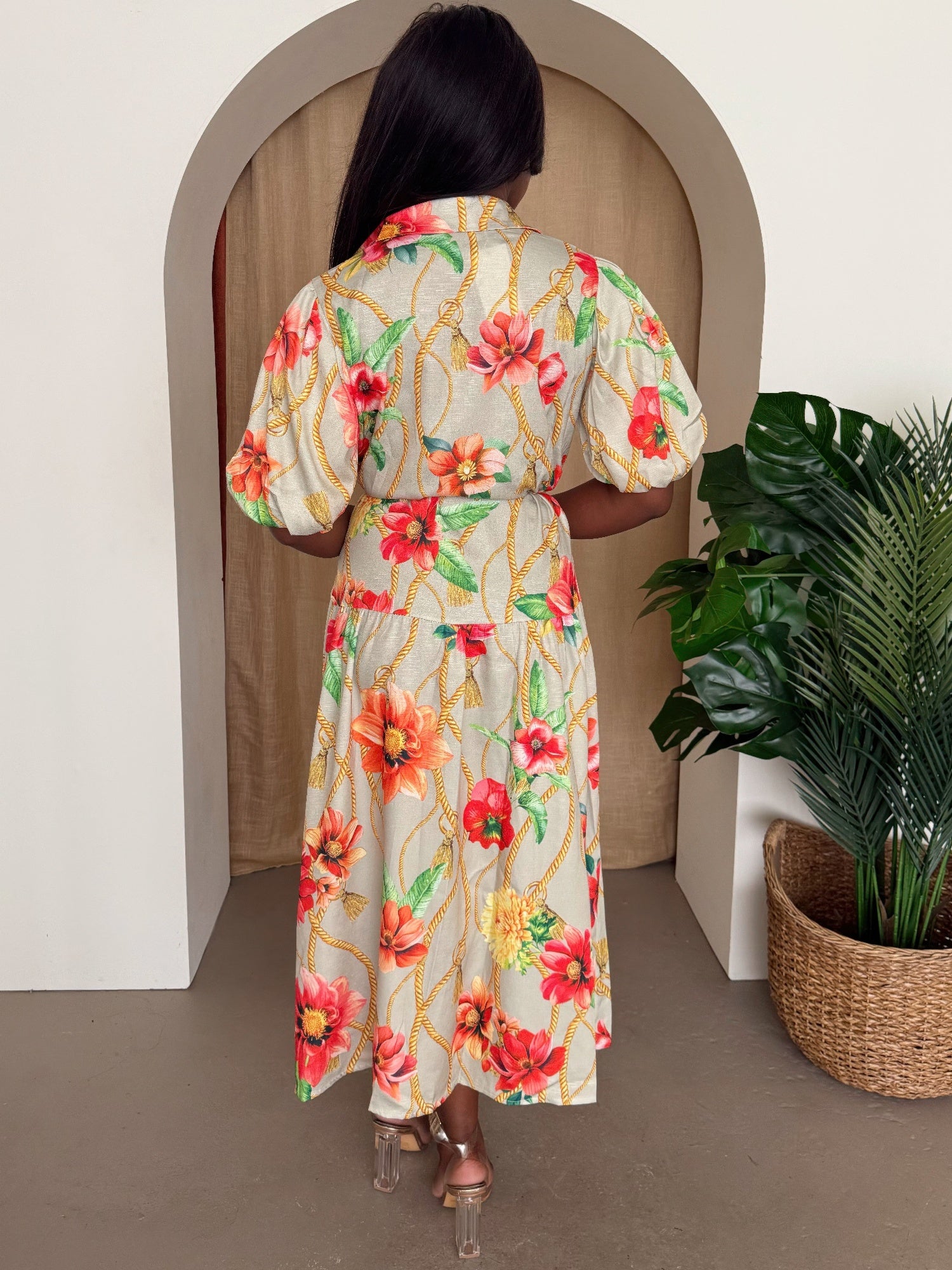 Back view: Tropic Thread dress floral midi with tie belt at waist, short puff sleeves