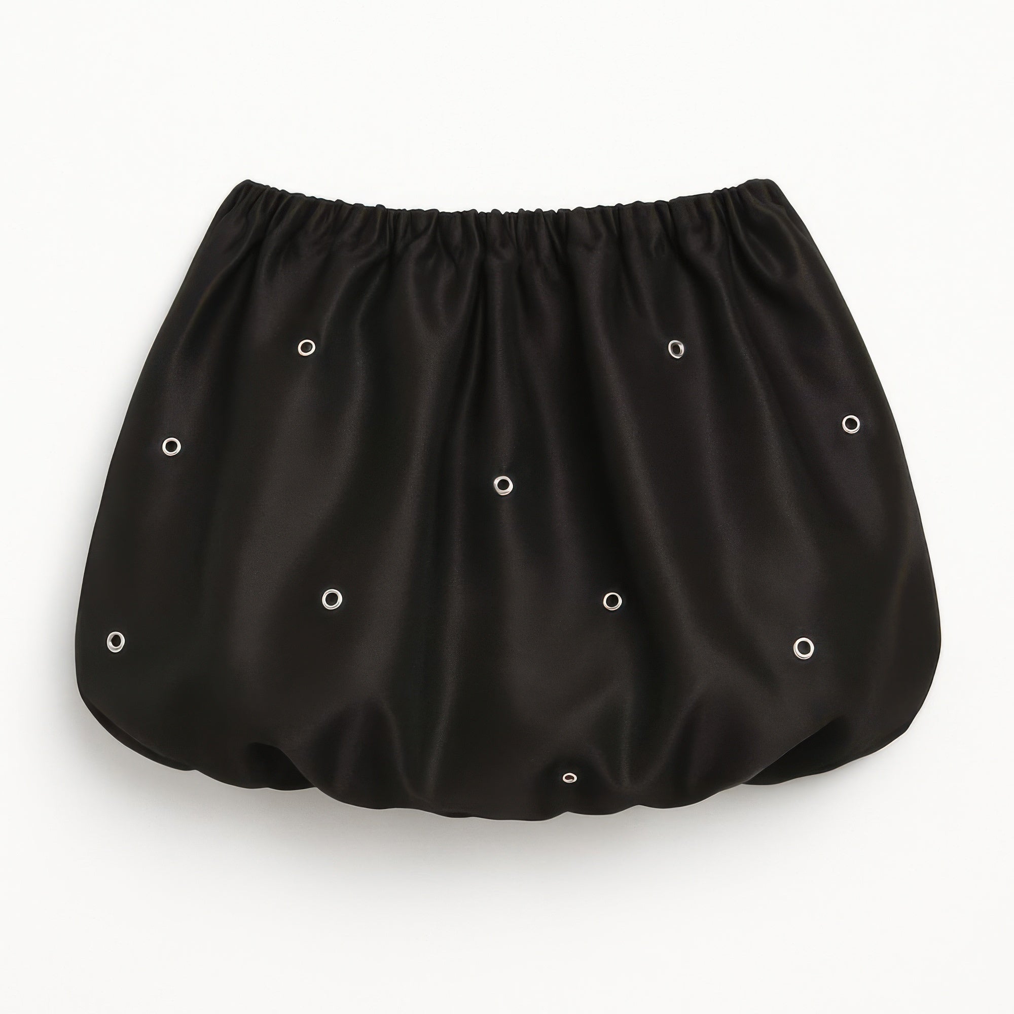 Black bubble mini skirt close-up: gathered waistband with silver eyelet pattern