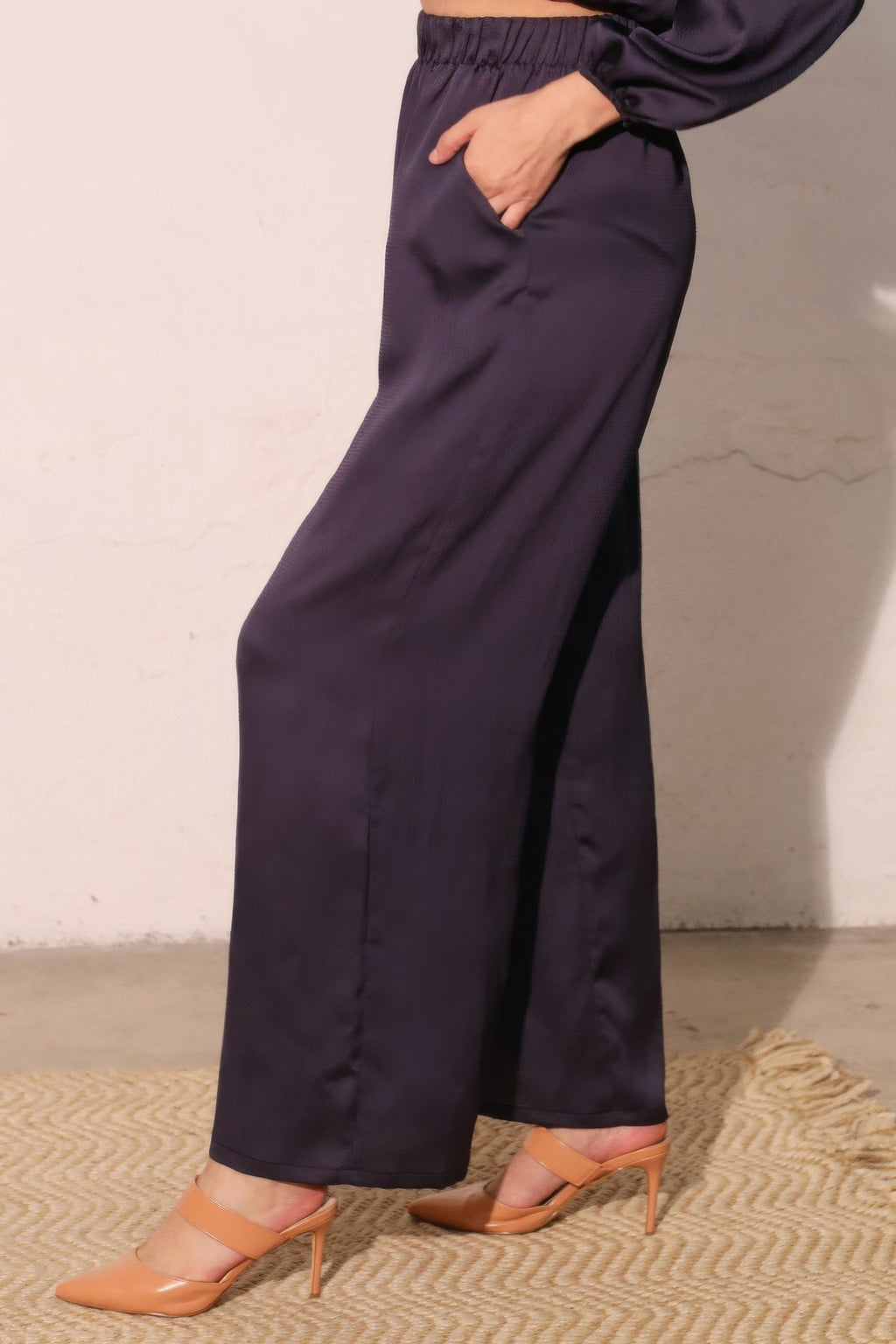 Navy hammered satin pocket pants close-up of side seam and wide-leg hem