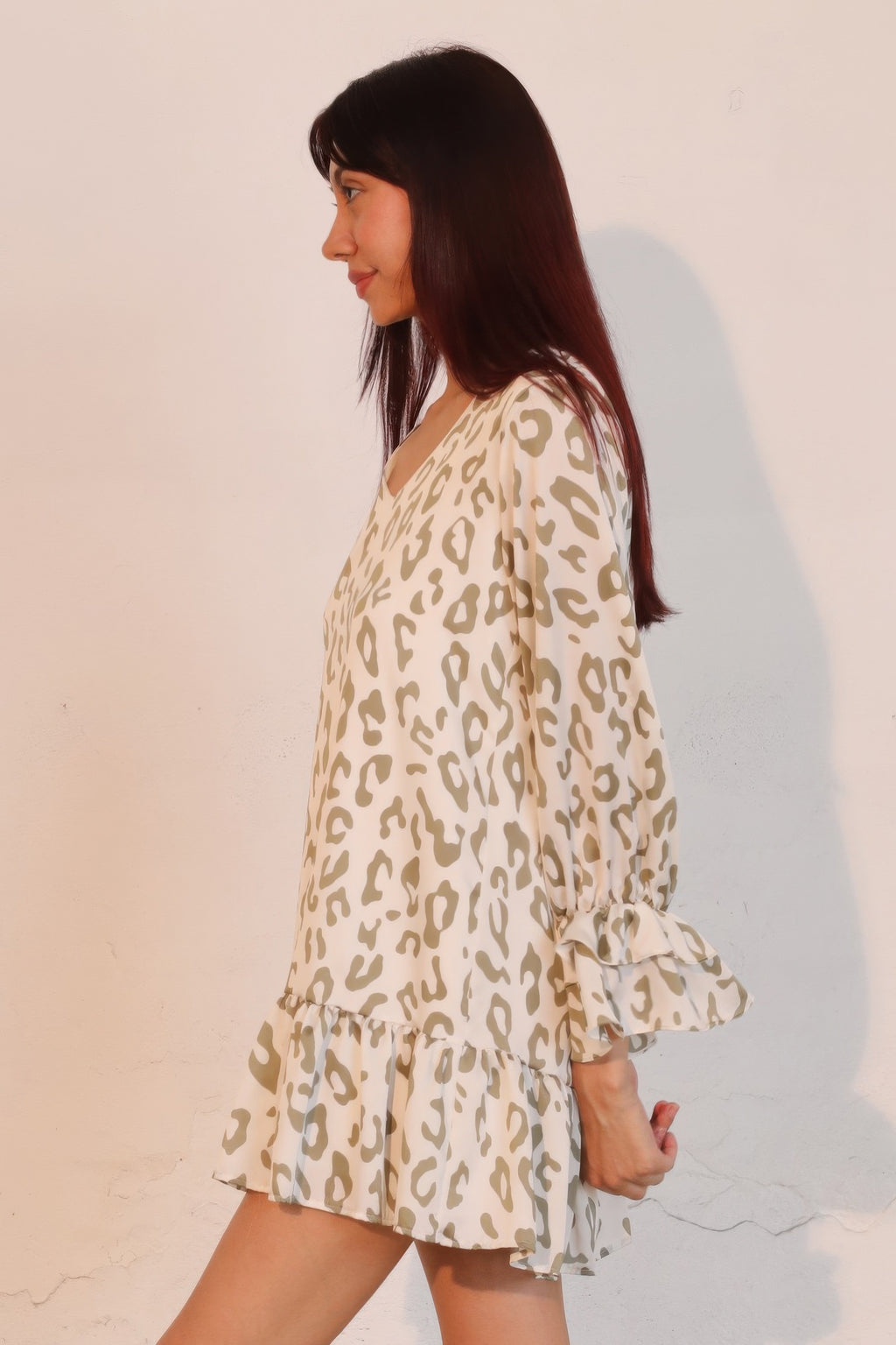 Beige and olive leopard print mini dress, long bell sleeves with ruffle cuffs and tiers