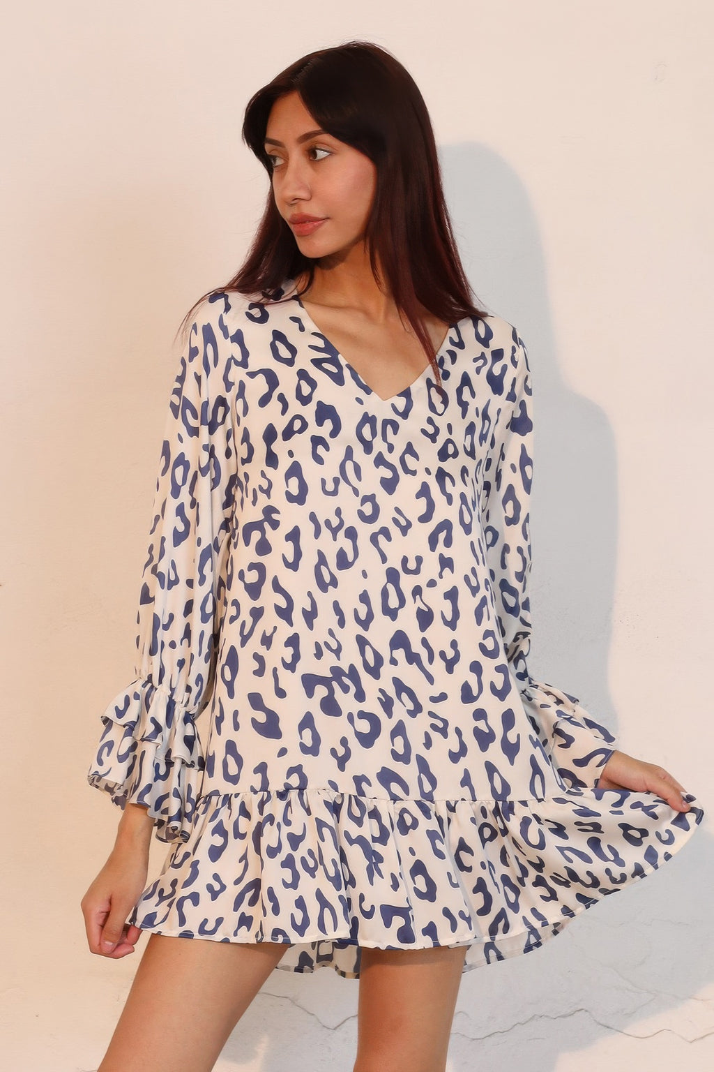 Blue leopard print mini dress with ruffled cuffs, V-neck, tiered skirt