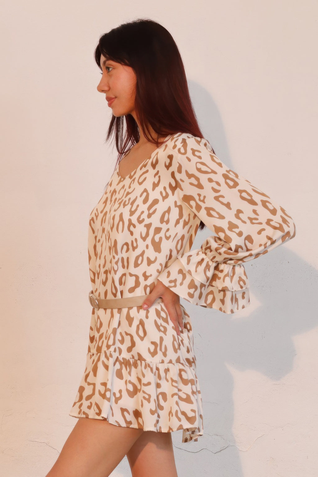 Beige leopard mini dress with V-neck, long ruffle-cuffed sleeves, belt tie at waist