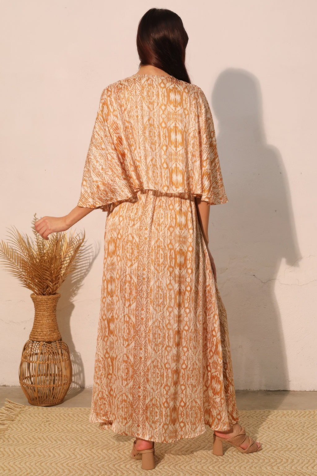 Bohemian maxi chiffon dress, back view, belt at waist, ankle-length patterned skirt