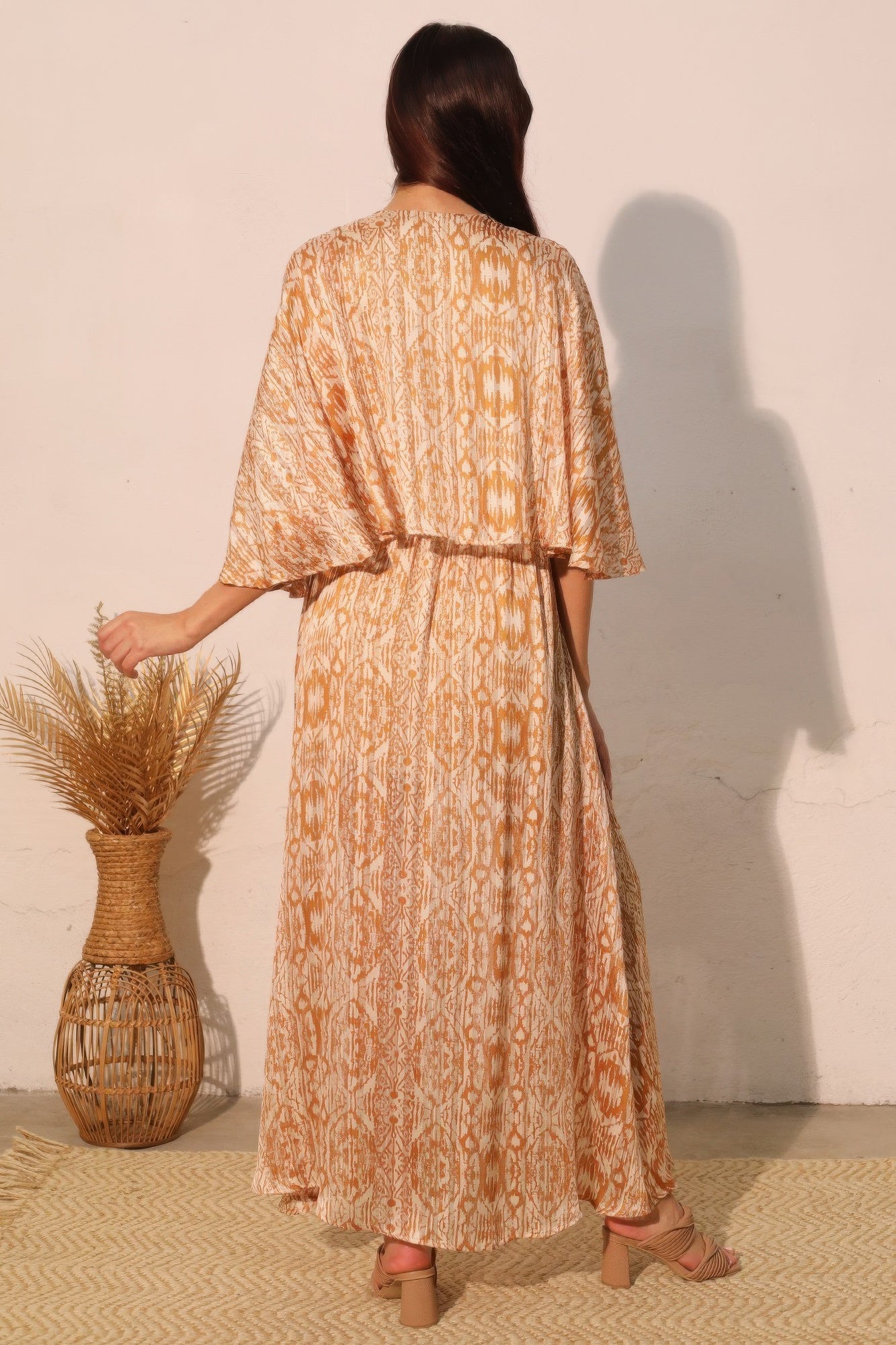 Bohemian maxi chiffon dress, back view, belt at waist, ankle-length patterned skirt