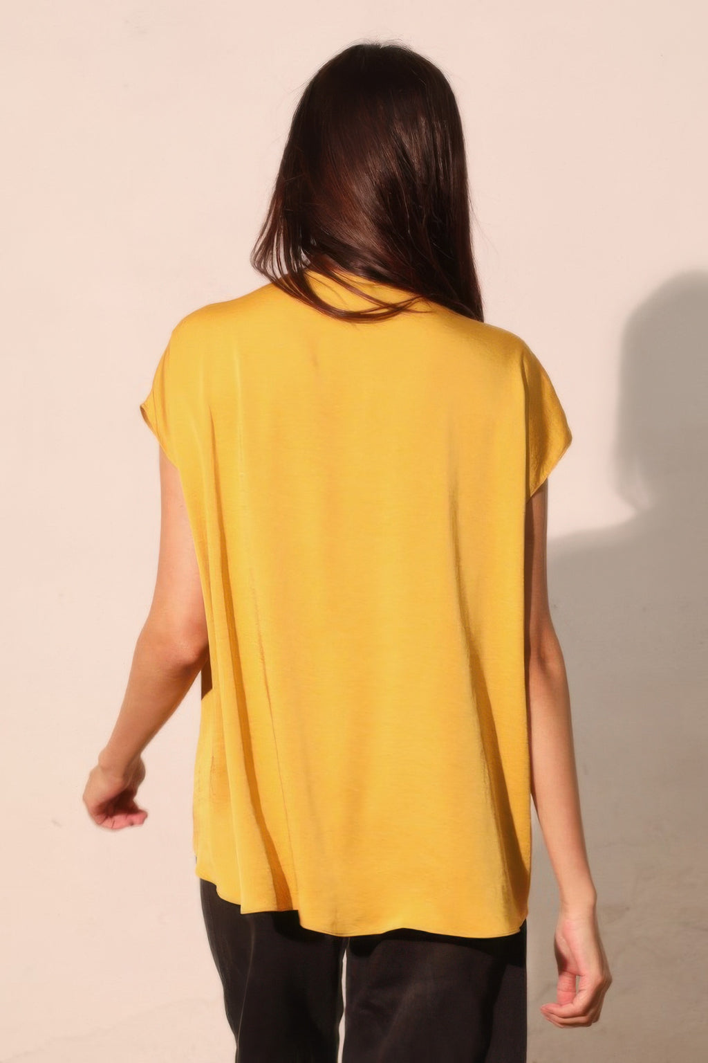 Mustard yellow tulip tunic top, back view, short sleeves and curved hem