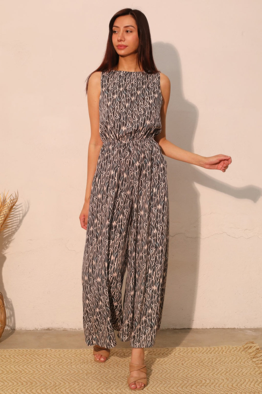 Night Meadow sleeveless bubble jumpsuit, black-and-white abstract print, gathered waist