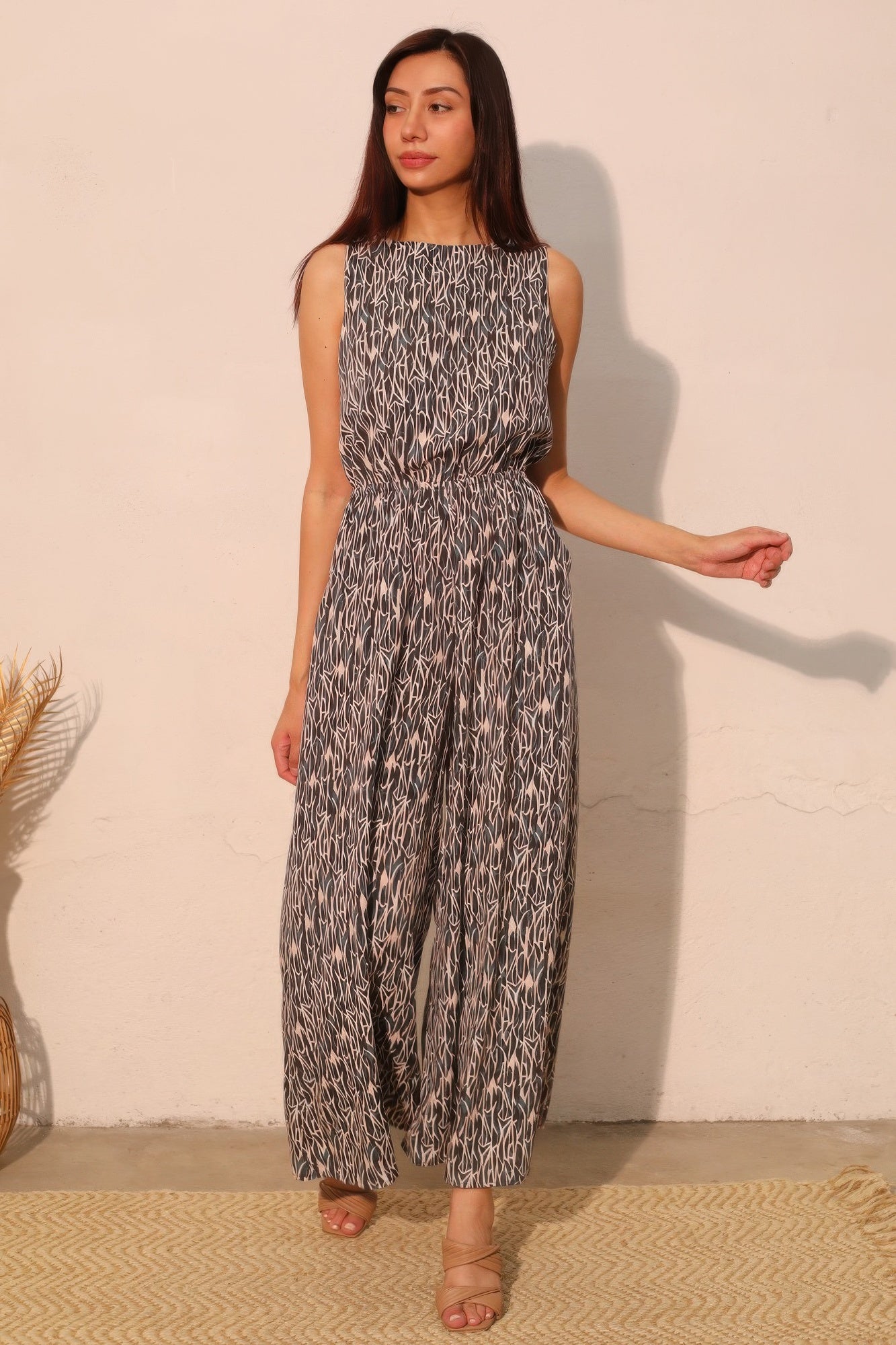 Night Meadow sleeveless bubble jumpsuit, black-and-white abstract print, gathered waist