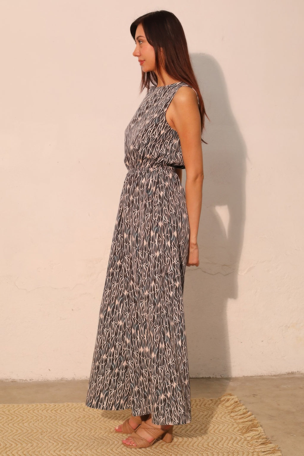 Night Meadow sleeveless bubble jumpsuit side view, flowy wide legs, abstract print