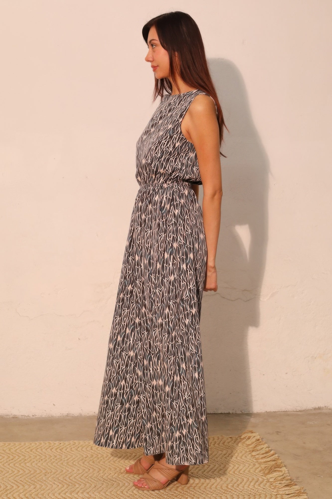 Night Meadow sleeveless bubble jumpsuit side view, flowy wide legs, abstract print
