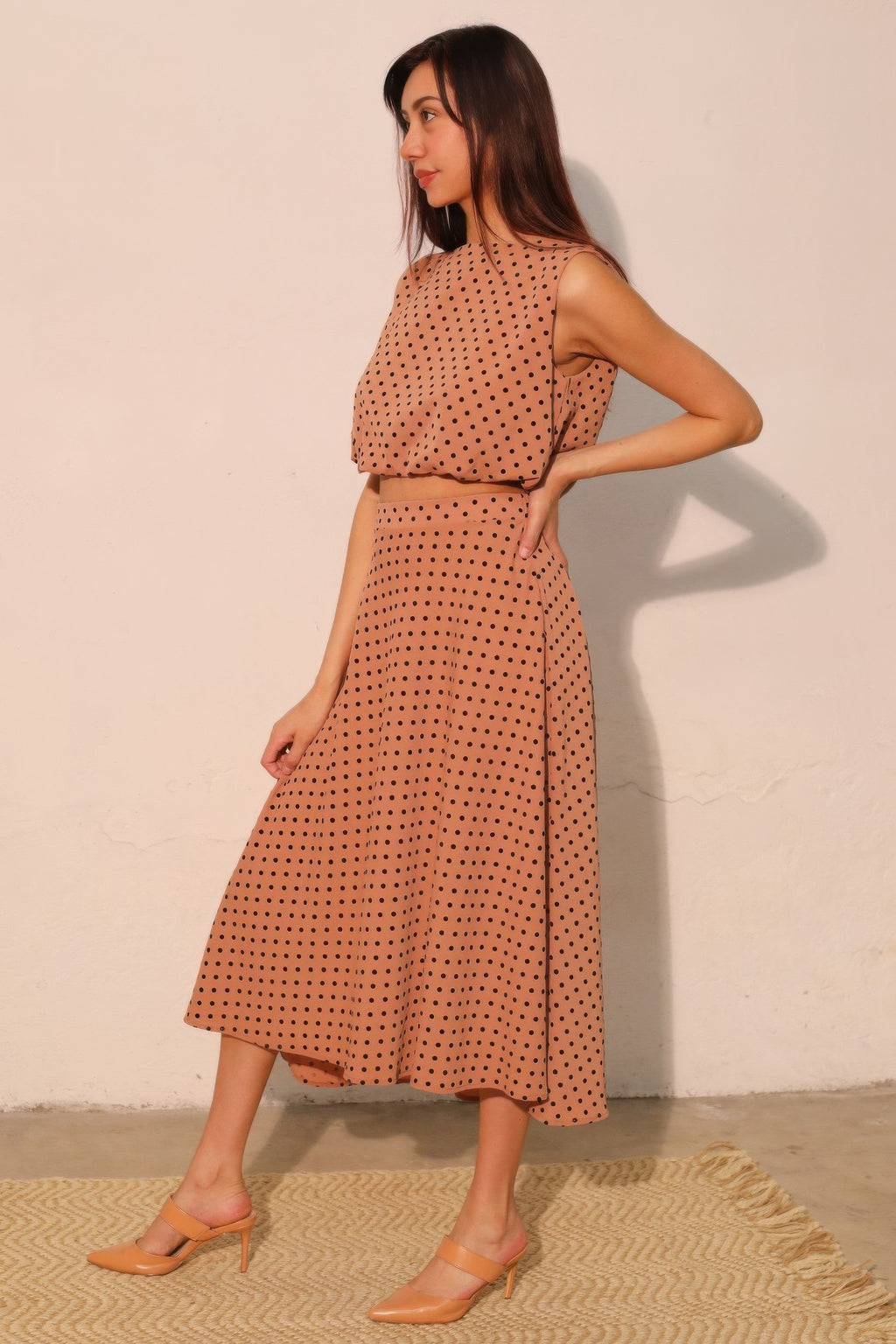 Flocked polka dot bubble crop top, sleeveless with raised neckline and ruffled bust