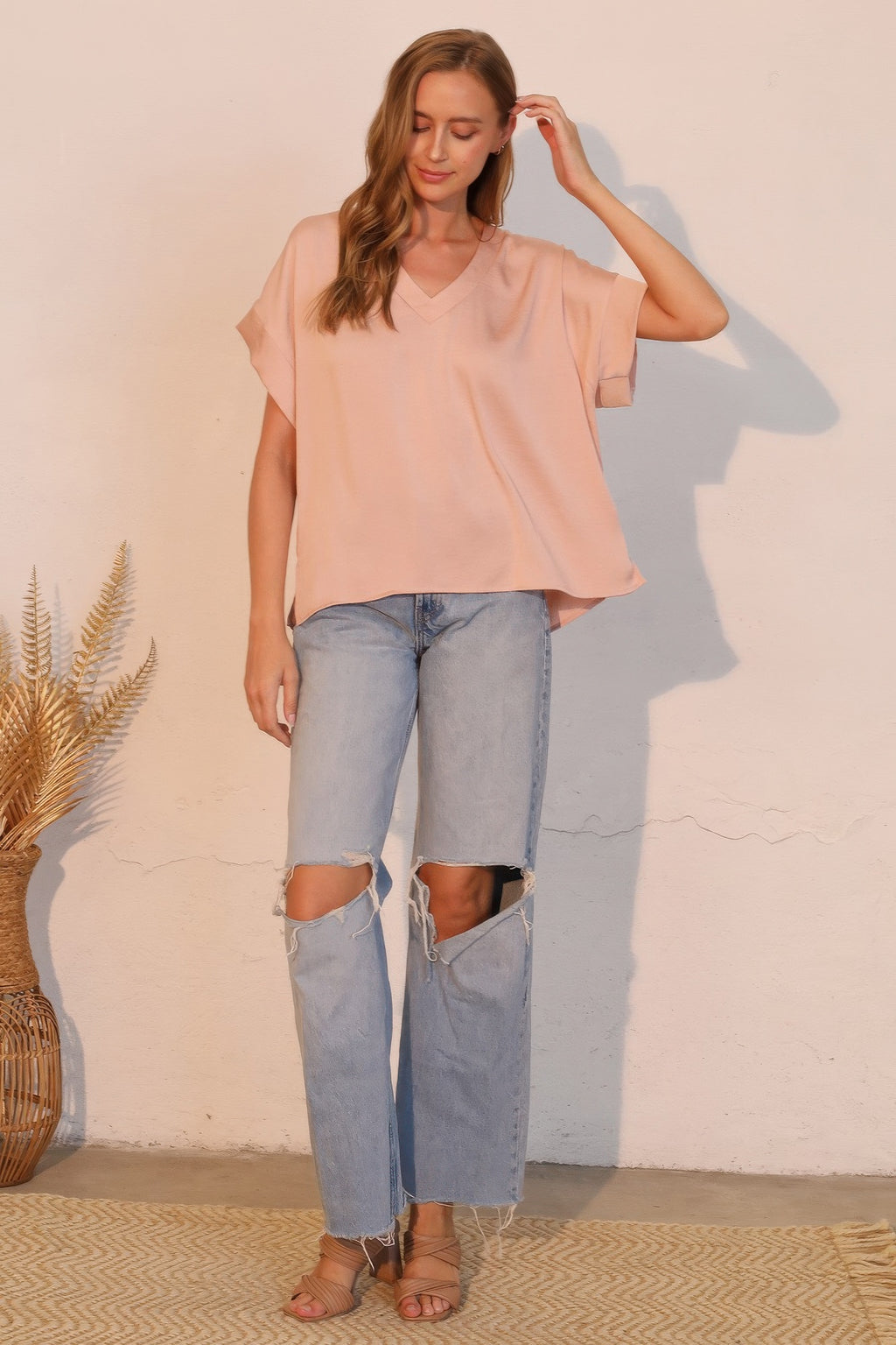 Rose champagne washed poly-silk V-neck tee with loose drape