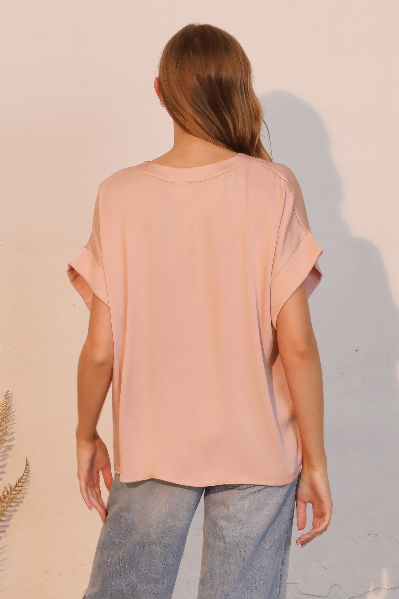 Back view: rose champagne washed poly-silk V-neck tee
