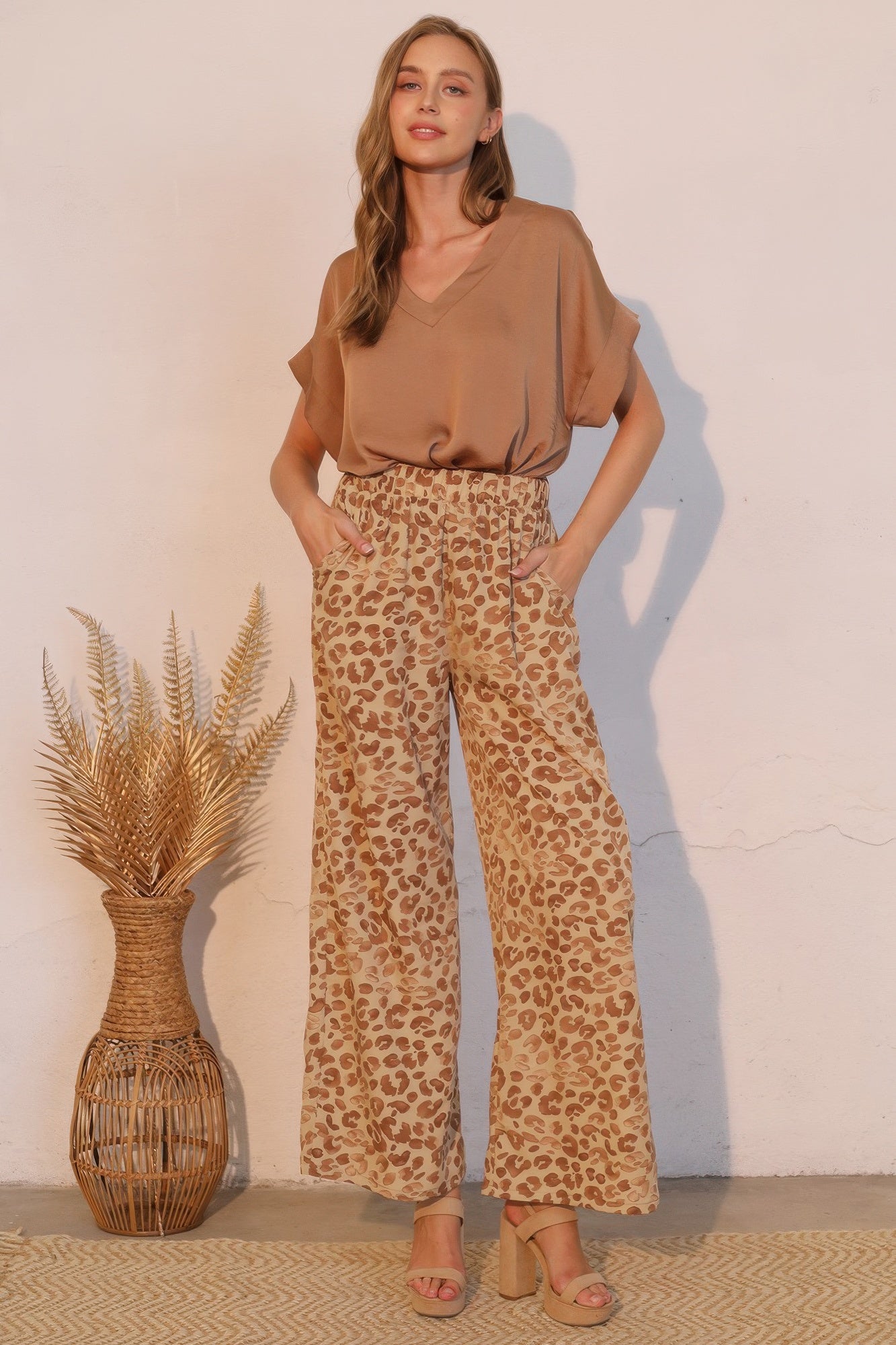 Cafe brown washed poly-silk V-neck tee with soft, flowy silhouette