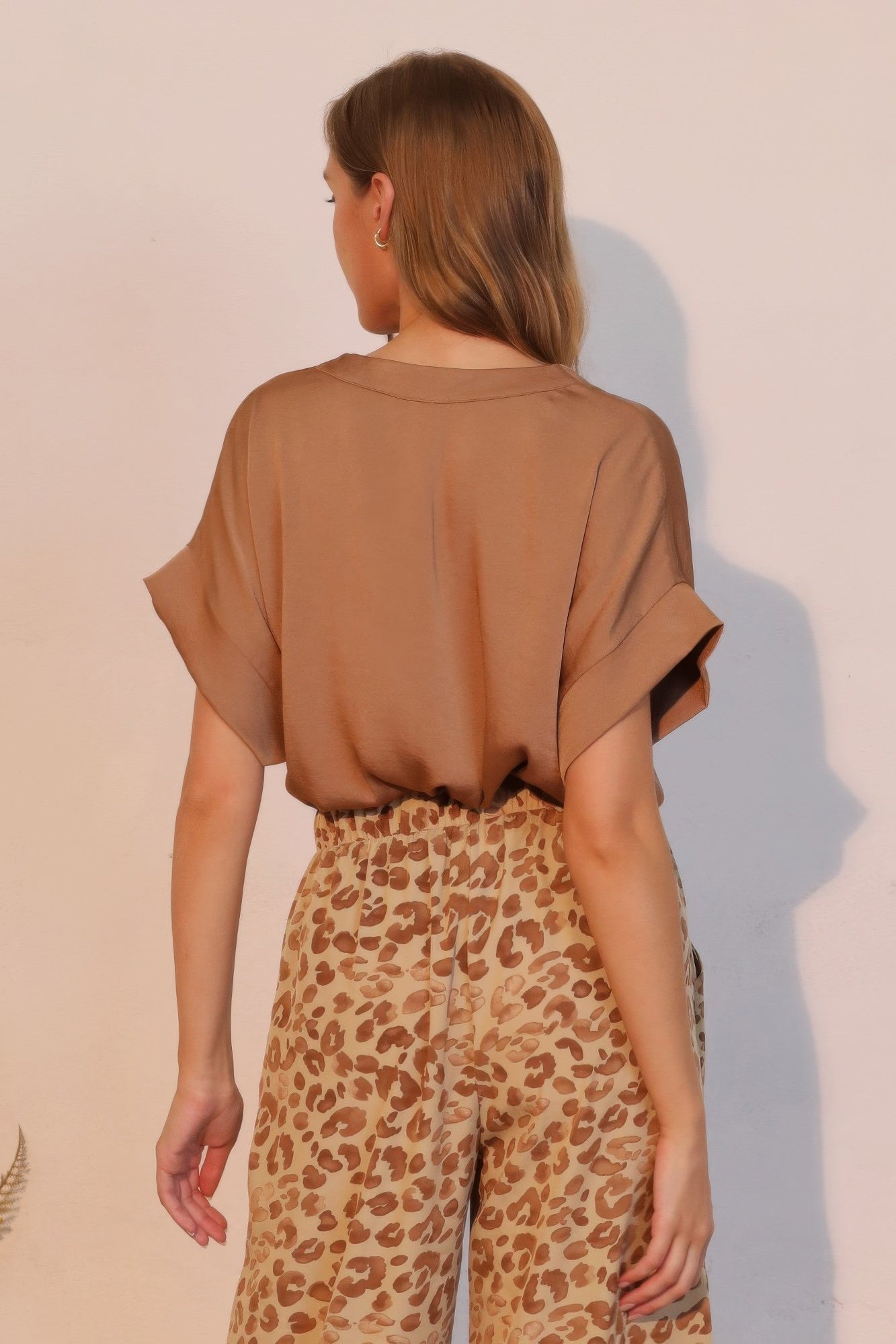 Back view: cafe brown washed poly-silk V-neck tee