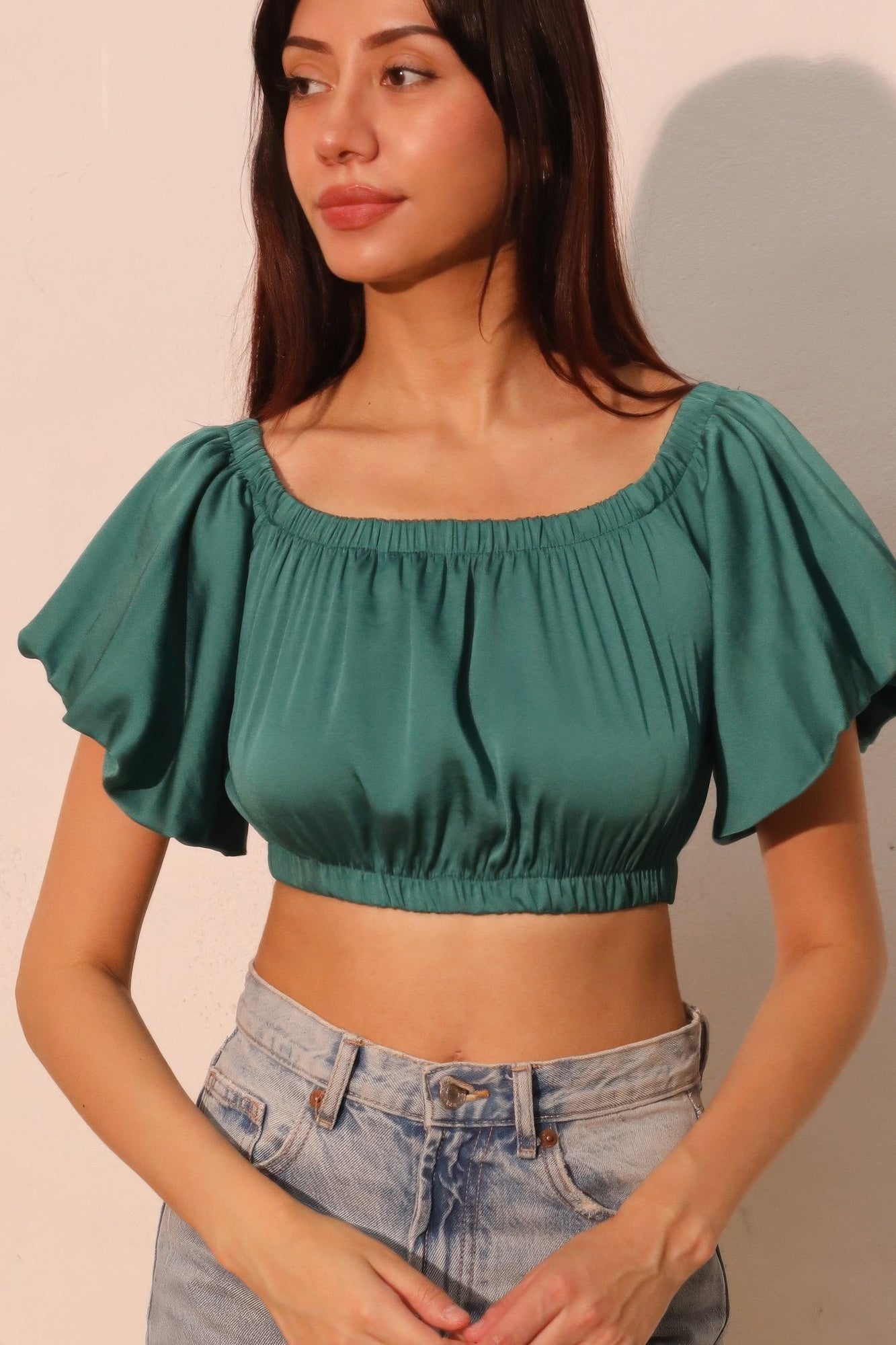 Forest green off-shoulder crop top with gathered bust and short puff sleeves