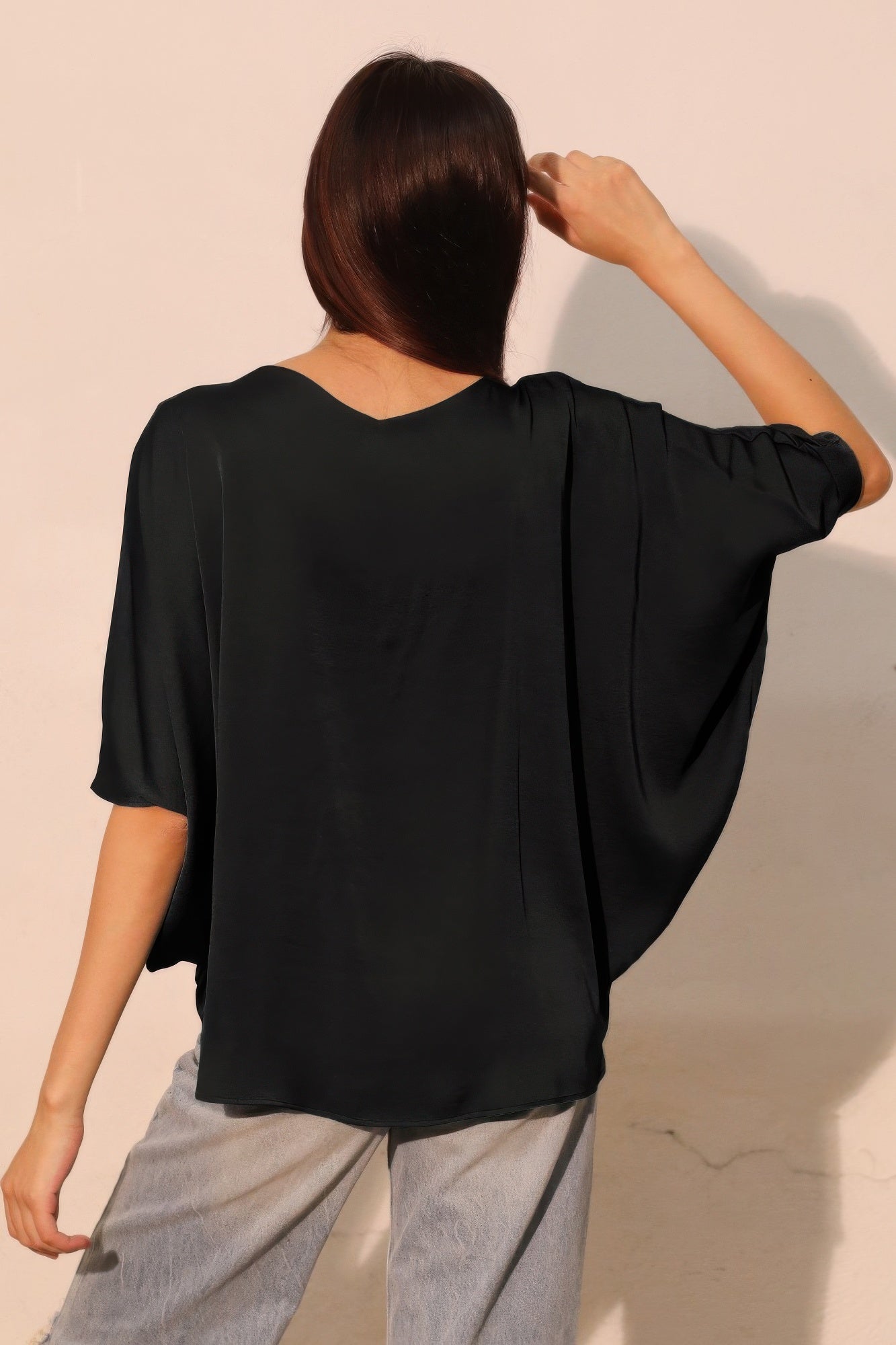 Washed poly-silk dolman top, black, back view, loose dolman sleeves